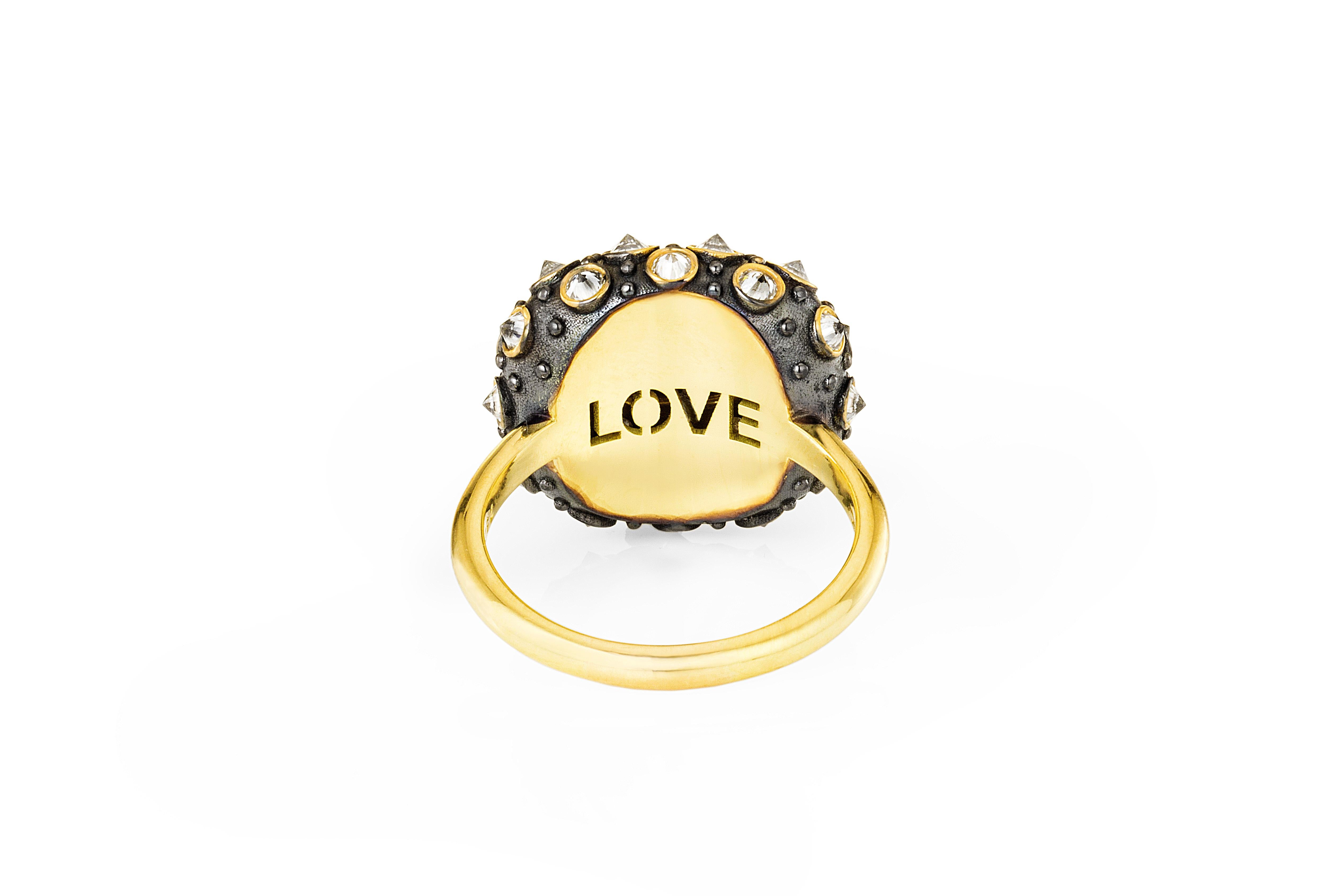 ONE of a KIND

The ‘My Funny Valentine’ Ring is an homage to the beautiful sea urchin and its totem of intuition and evolution. This beautiful work of art is one-of-a-kind. The unique sea urchin dot pattern, in yellow gold and highlighted in black