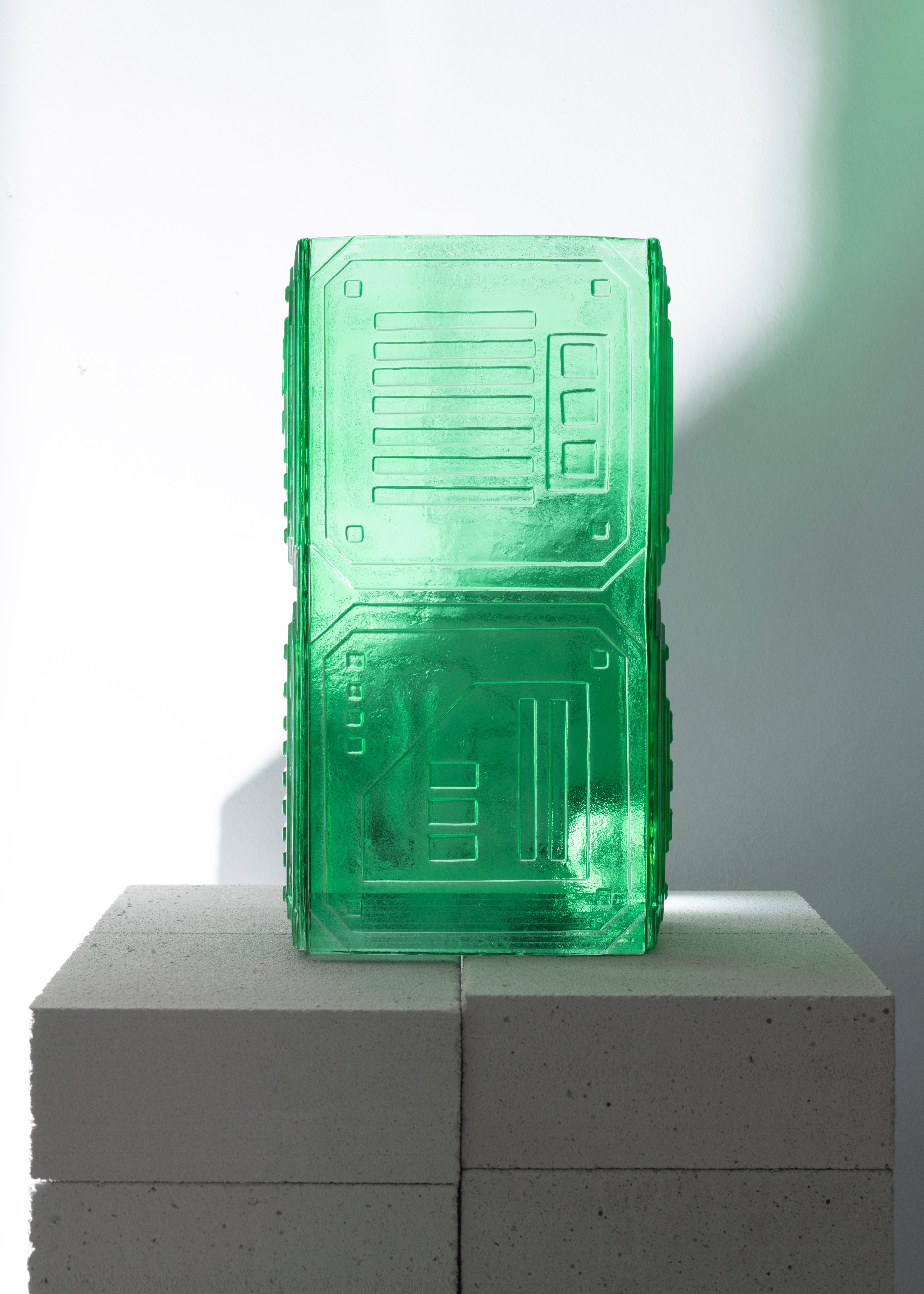 Analogic Sci-Fi Green Vase by Mut Design
Limited Edition
Dimensions: D 25 x W 25 x H 45 cm.
Materials: Glass colored.

Inspired by computer motherboards and the flamboyant spacecrafts of the Starwars saga, this very limited edition of sci-fi vases