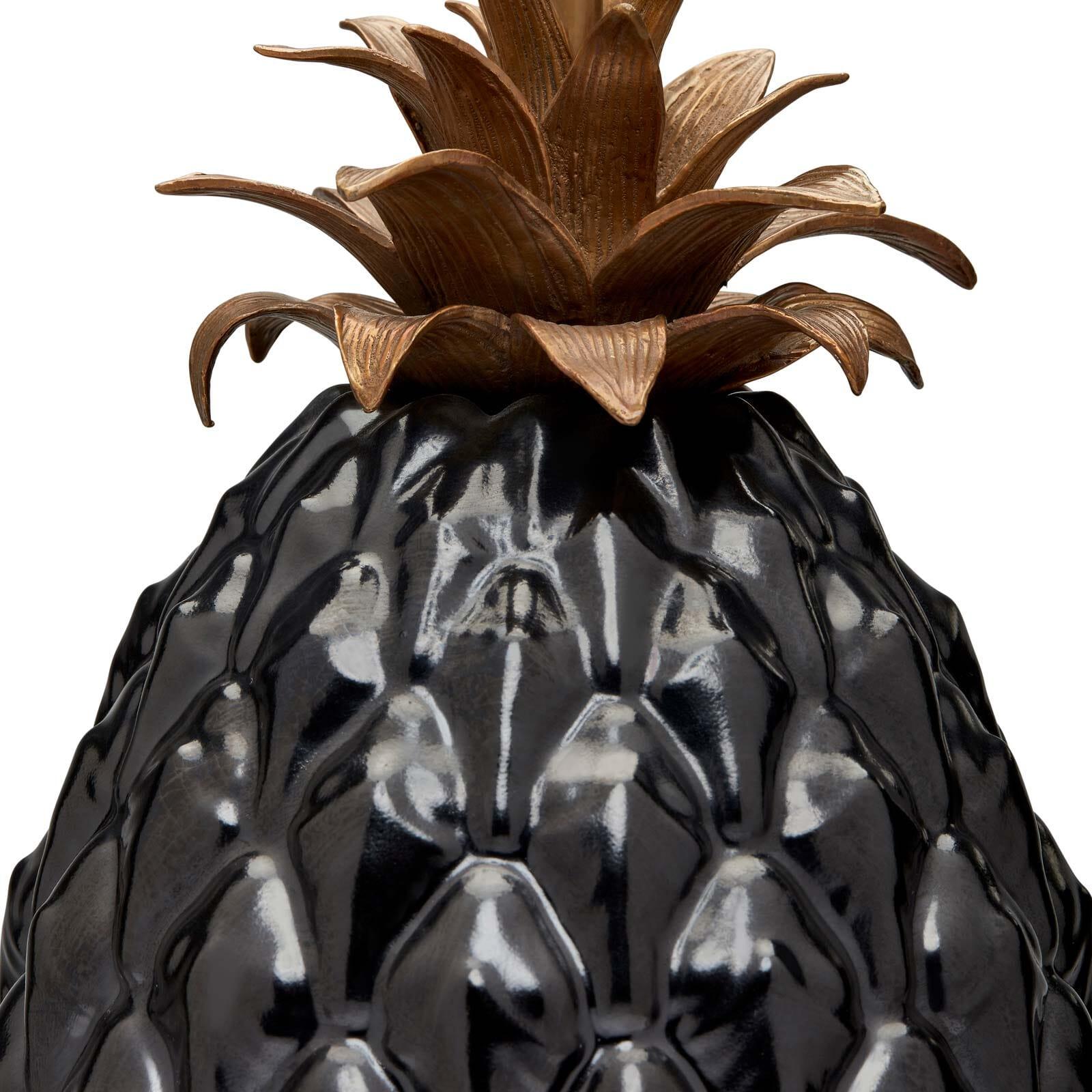 A darker take on our popular ANANAS pineapple lamp-stand, this black porcelain version will imbue your home with opulent glamour. Sure to provide a talking point with guests, it's a statement-making style you'll cherish for years to come. 

Please