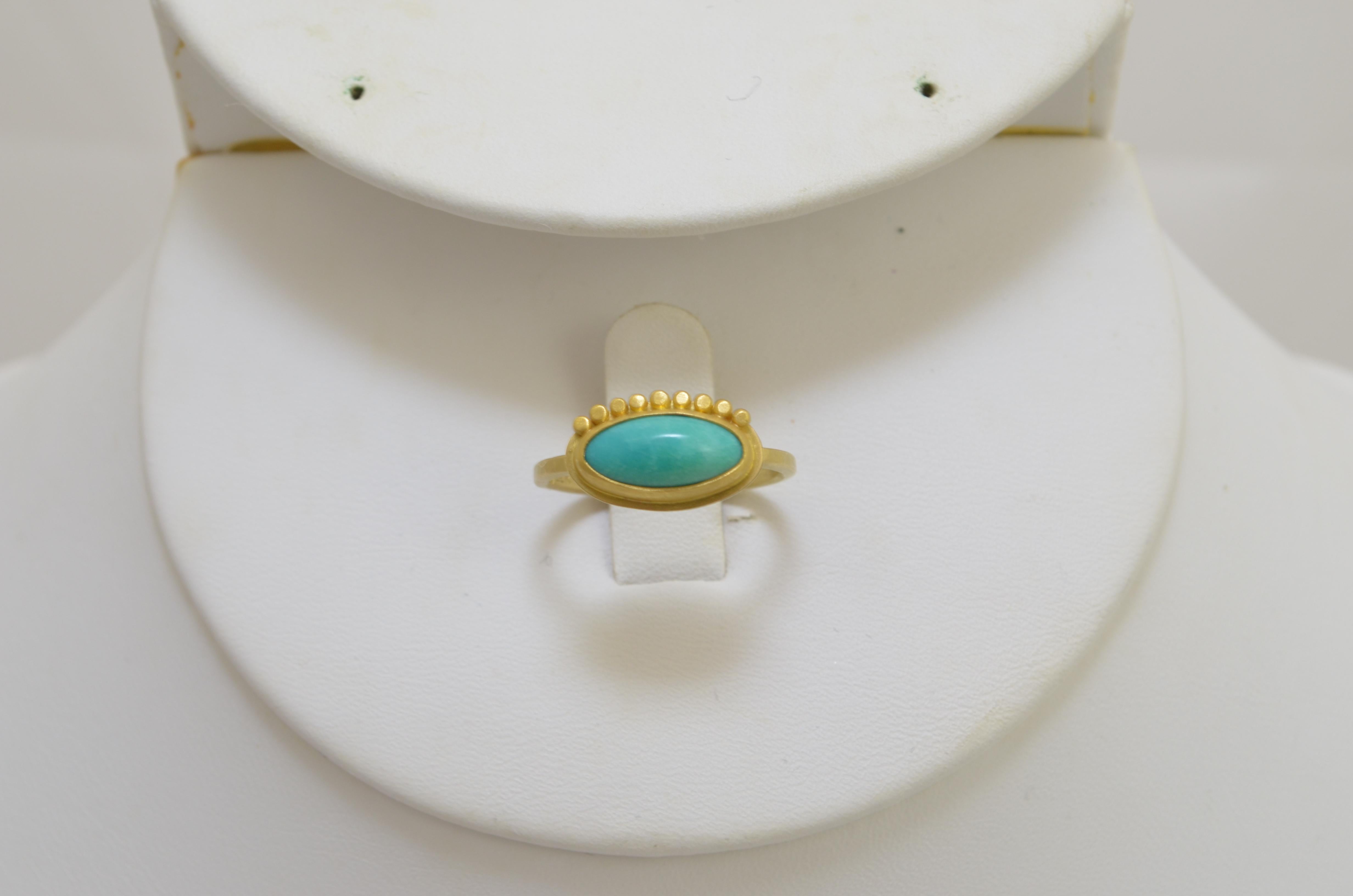 Ananda Khalsa 22k Gold Evil Eye Ring with Turquoise — Size 7 ring with a turquoise “evil eye” at the center. Ring stamped “22k 18k” and designer marking.