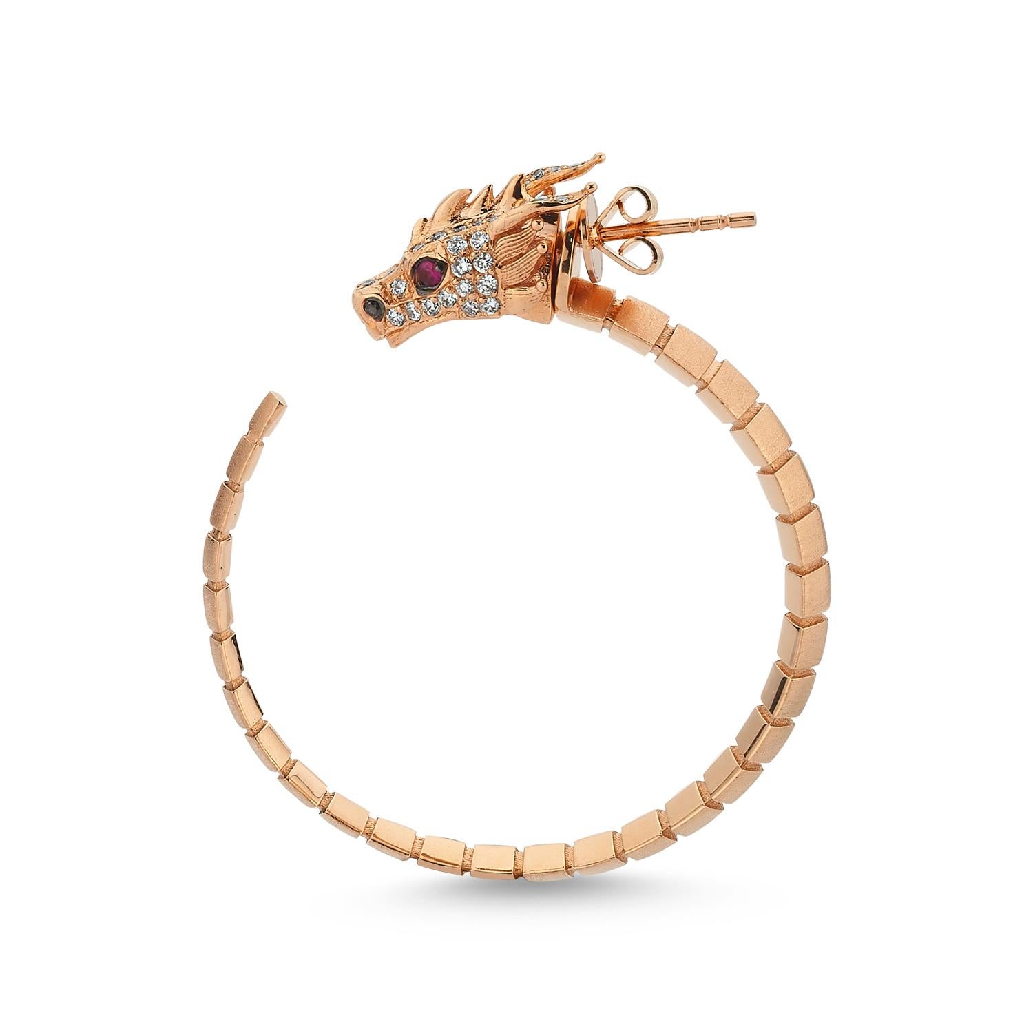 Dragon Lady Collection is inspired by the fire element which is one of the elements that represents our life energy. The main form of the collection is dragon; it is the symbol of strength, courage and prosperity.

Ananta sesha 14k rose gold hoop