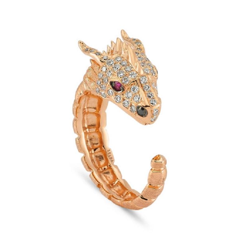 Dragon Lady Collection is inspired by the fire element which is one of the elements that represents our life energy. The main form of the collection is dragon; it is the symbol of strength, courage and prosperity. 

 Ananta sesha large head ring in