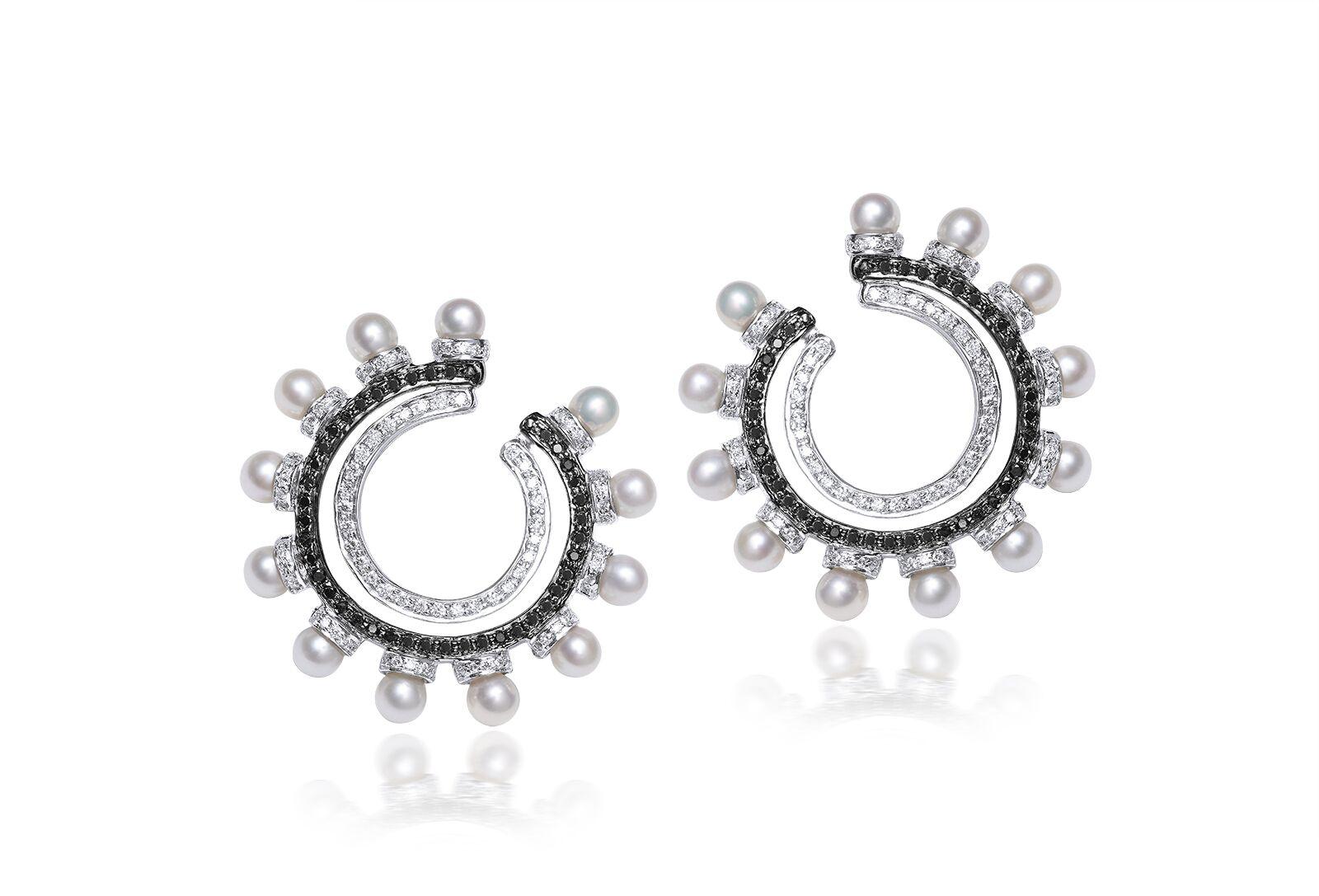 Ananya Balance C-Clip Earrings set with Pearls and Diamonds
Set in 18K White gold

Total diamond weight: 1.83 ct
Color: F-G
Clarity: VVS1

Total pearl weight: 15.01 ct

38mm x 35 mm