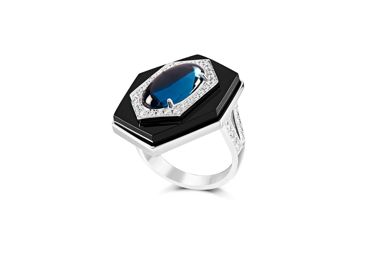 Ananya Celeste Ring set with Topaz , Onyx and Diamonds
Set in 18K White gold

Total diamond weight: 0.56 ct
Color: F-G
Clarity: VVS1

Total blue topaz weight: 5.15 ct