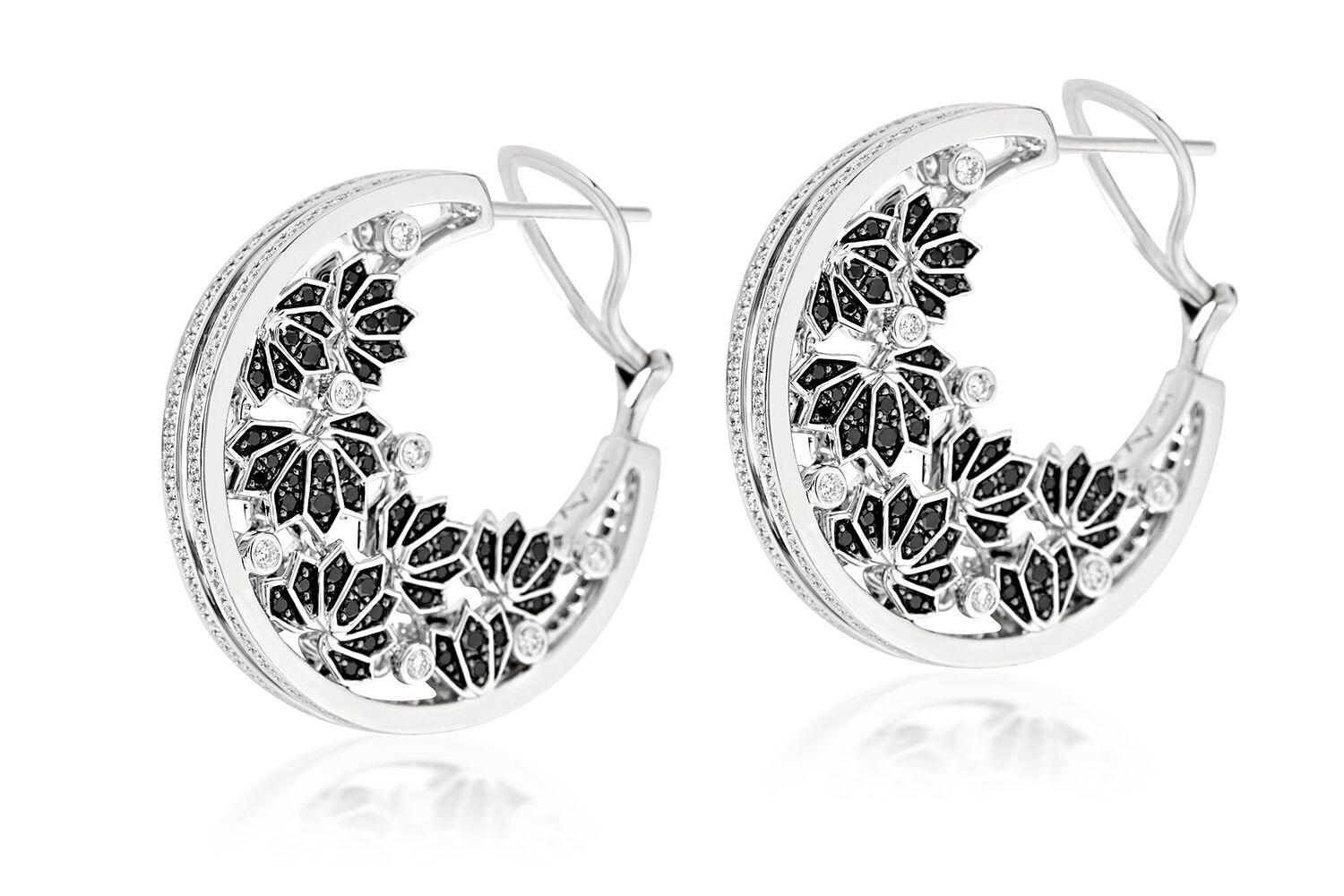 ANANYA LOTUS SAMSARA EARRINGS SET WITH DIAMONDS


Set in 18K White gold


Total diamond weight: 1.75 ct
Color: F-G
Clarity: VVS1

Total black diamond weight: 1.53 ct

32mm drop