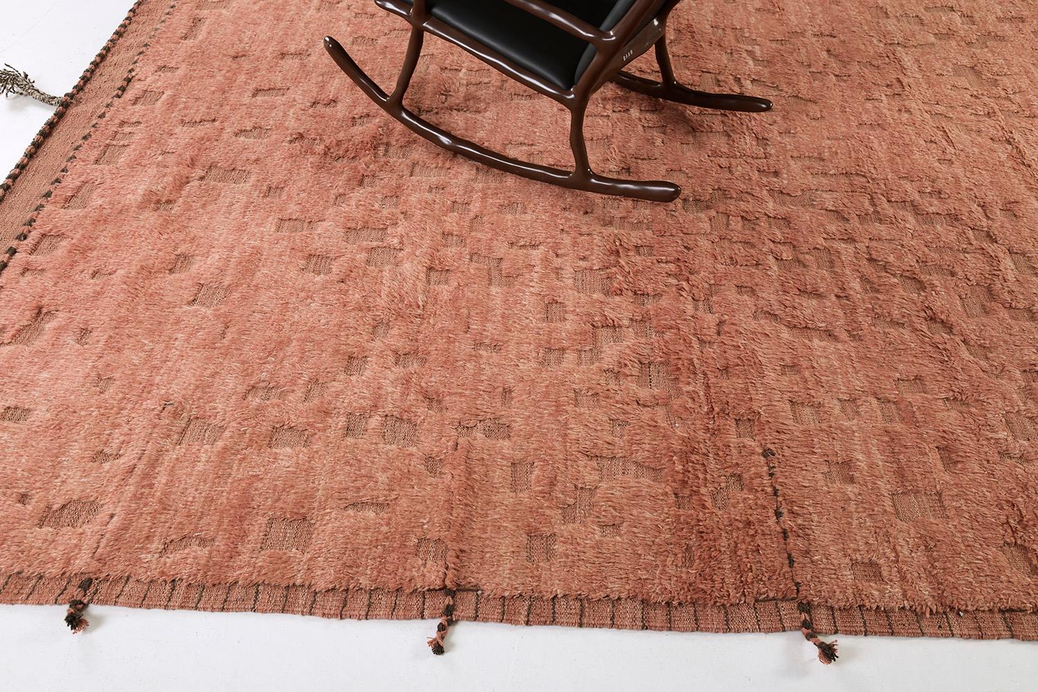 Anaruz is a pile of woven wool that features a modern-contemporary design through the shades of pink and red. With its sought-after brilliant unique style, this masterpiece is everyone's dream collection. Mehraban's Atlas collection is noted for its