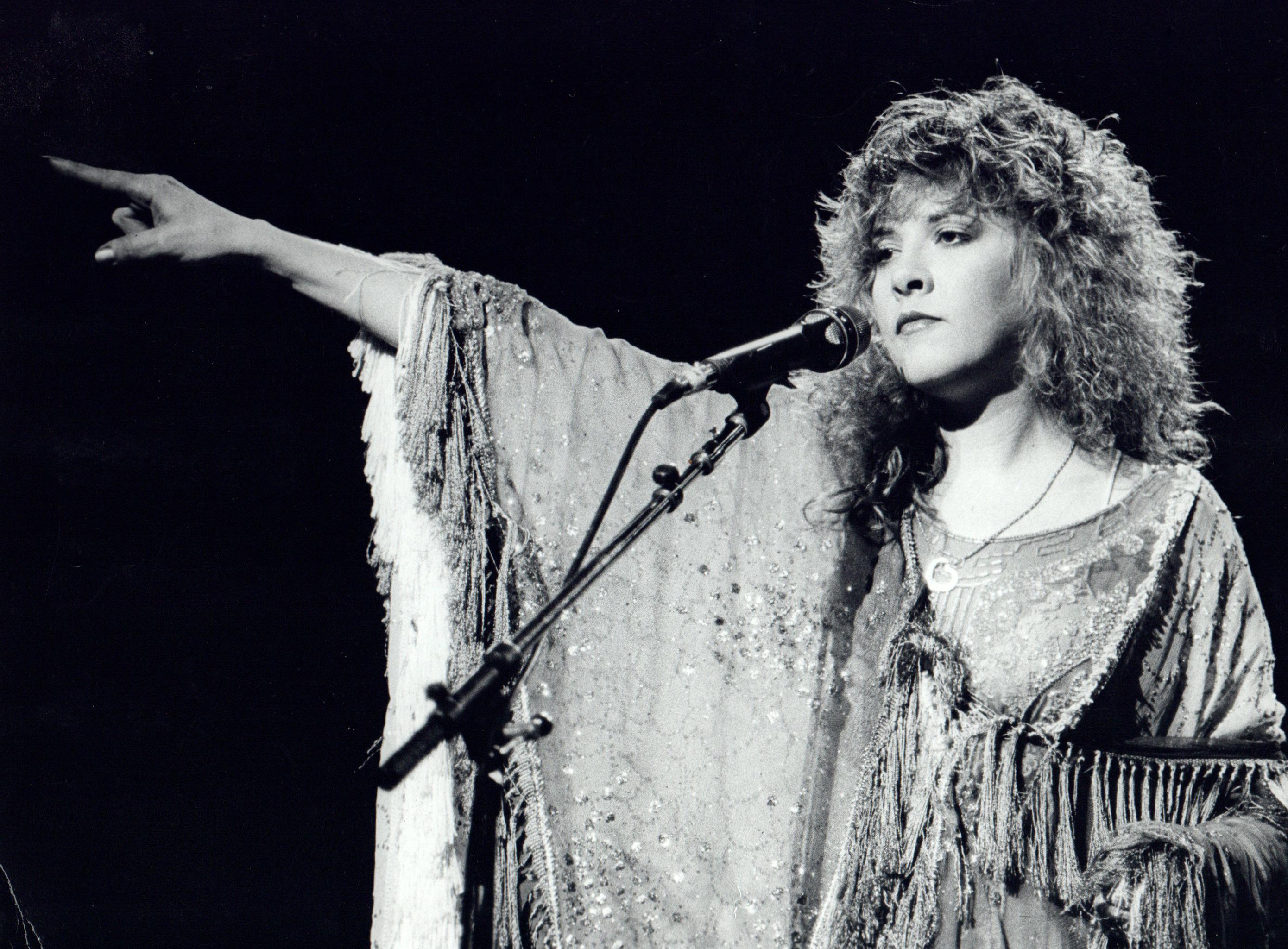 Anastasia Pantsios Portrait Photograph - Stevie Nicks of Fleetwood Mac Pointing on Stage Vintage Original Photograph