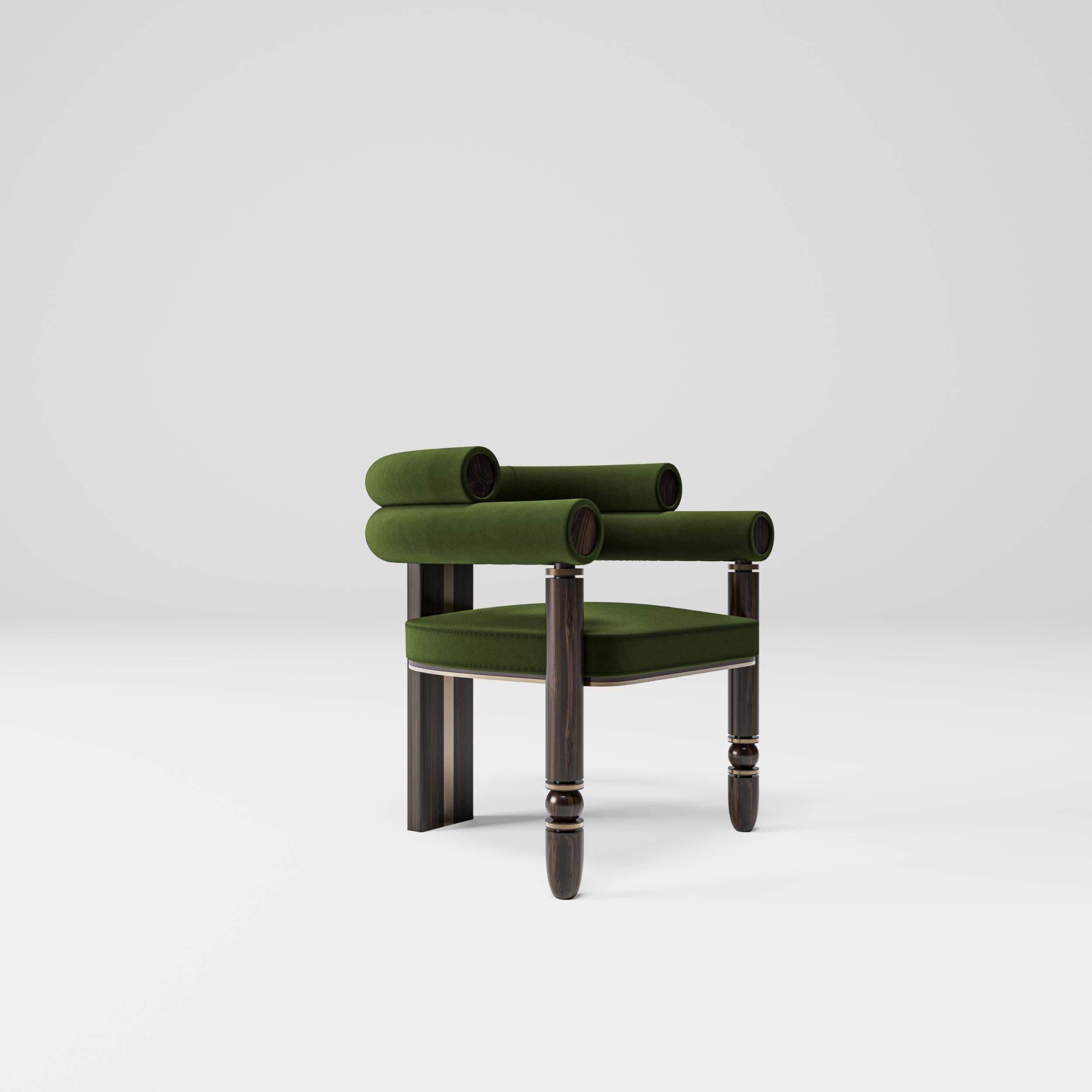 Anatolian chair

Taking its flamboyant and sociable attitude from the color of brass, and its naive and shy attitude from chestnut wood, the Anatolian chair transforms into a Mid-Century style with its green velvet upholstery. Designer Mehmet