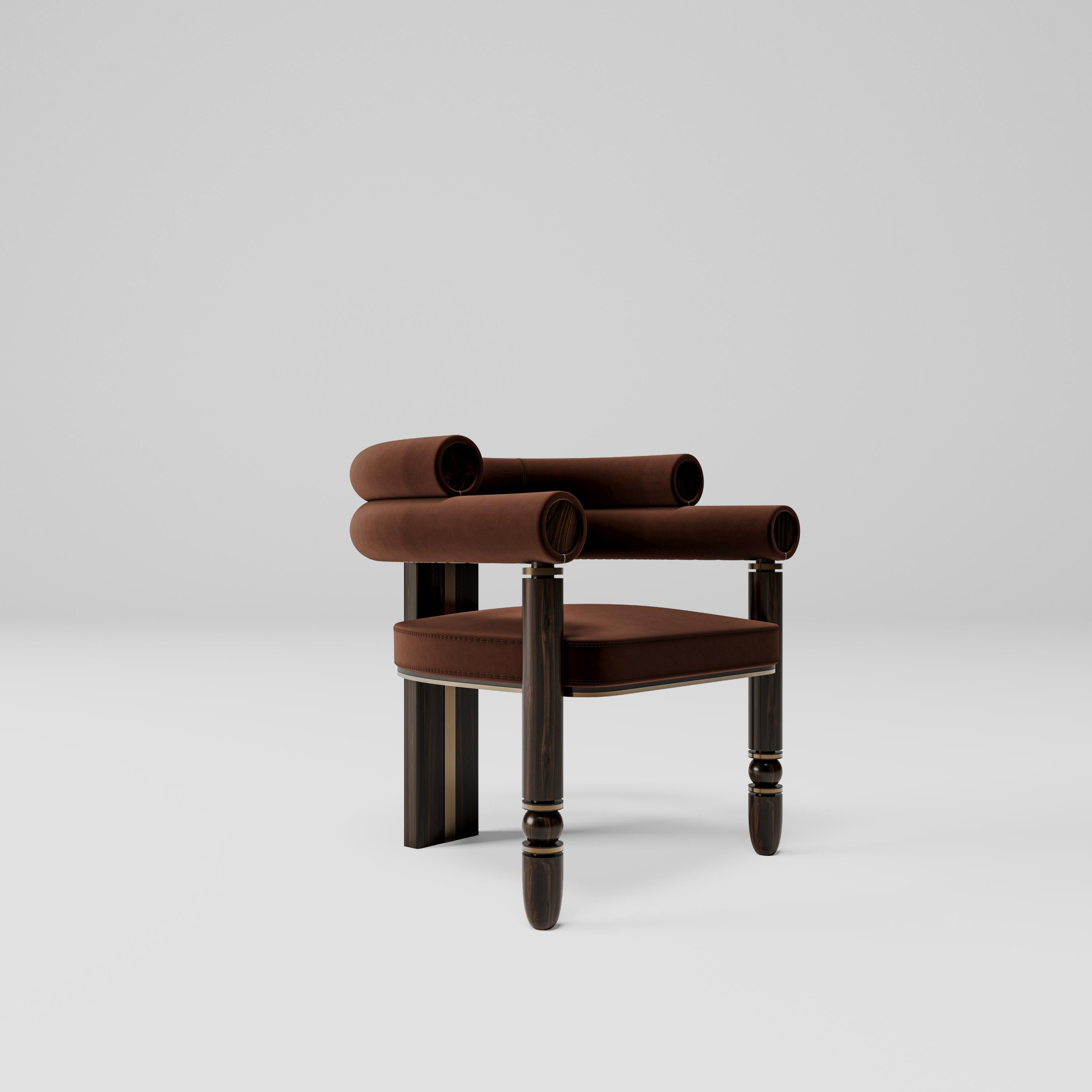 Anatolian Chair

Taking its flamboyant and sociable attitude from the color of brass, and its naive and shy attitude from chestnut wood, the Anatolian chair transforms into a Mid-Century style with its velvet upholstery. Designer Mehmet Orel, who