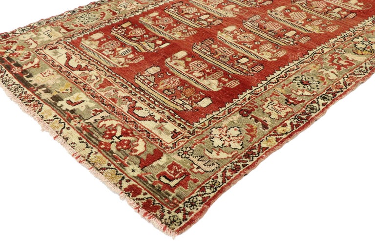 53110, vintage Anatolian Kirsehir Village Prayer rug, Turkish Pictorial rug. With its luminous warm hues and beguiling beauty, this hand knotted wool vintage Anatolian Kirsehir prayer rug is full of history with woven tales from the past. The