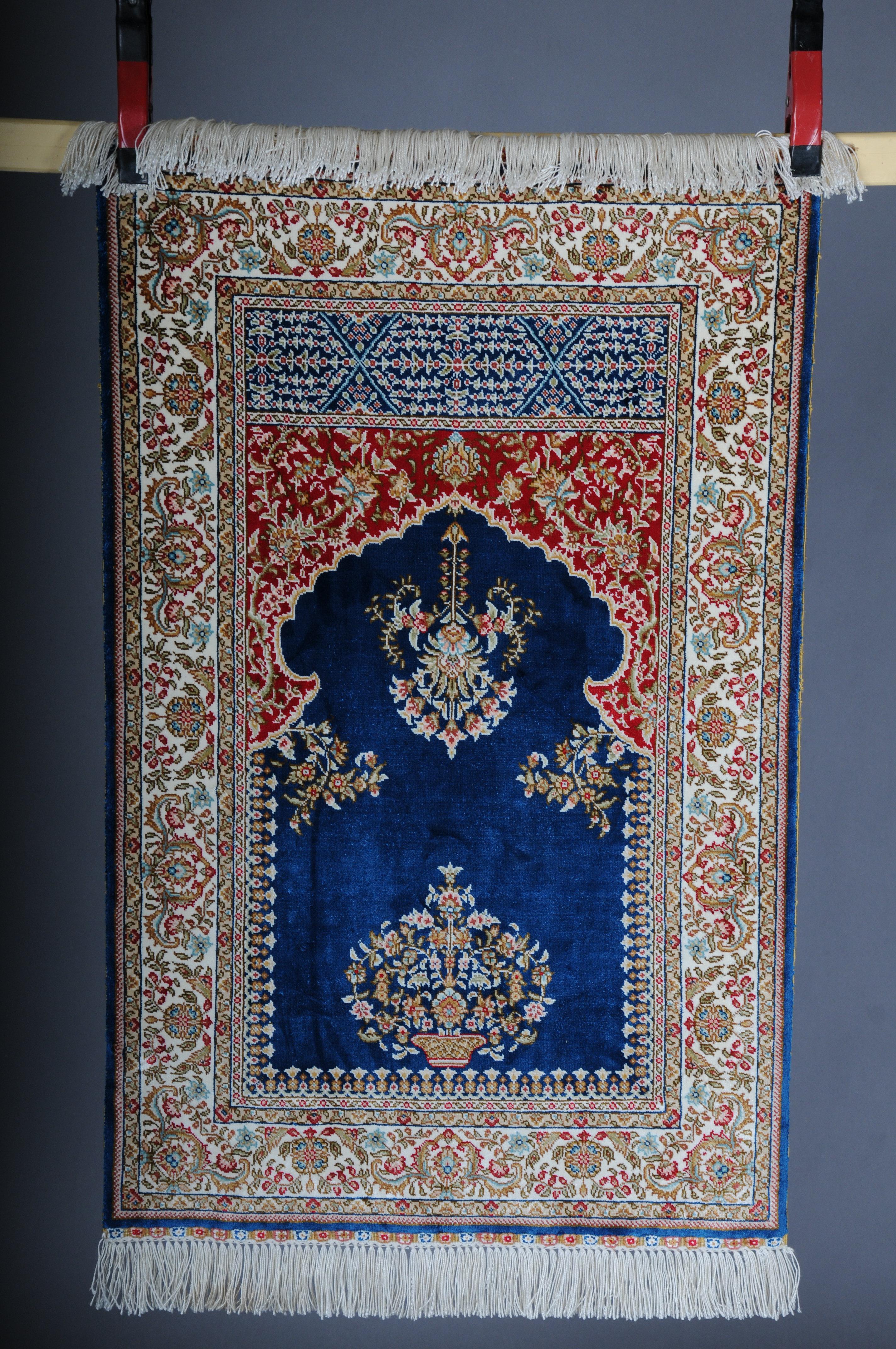 Anatolian prayer rug/tapestry cotton/silk, 20th century

This hand-knotted Hereke rug is a magnificent addition to your living space. Once intended for imperial palaces, the detailed work of art now decorates your home. Only natural materials are