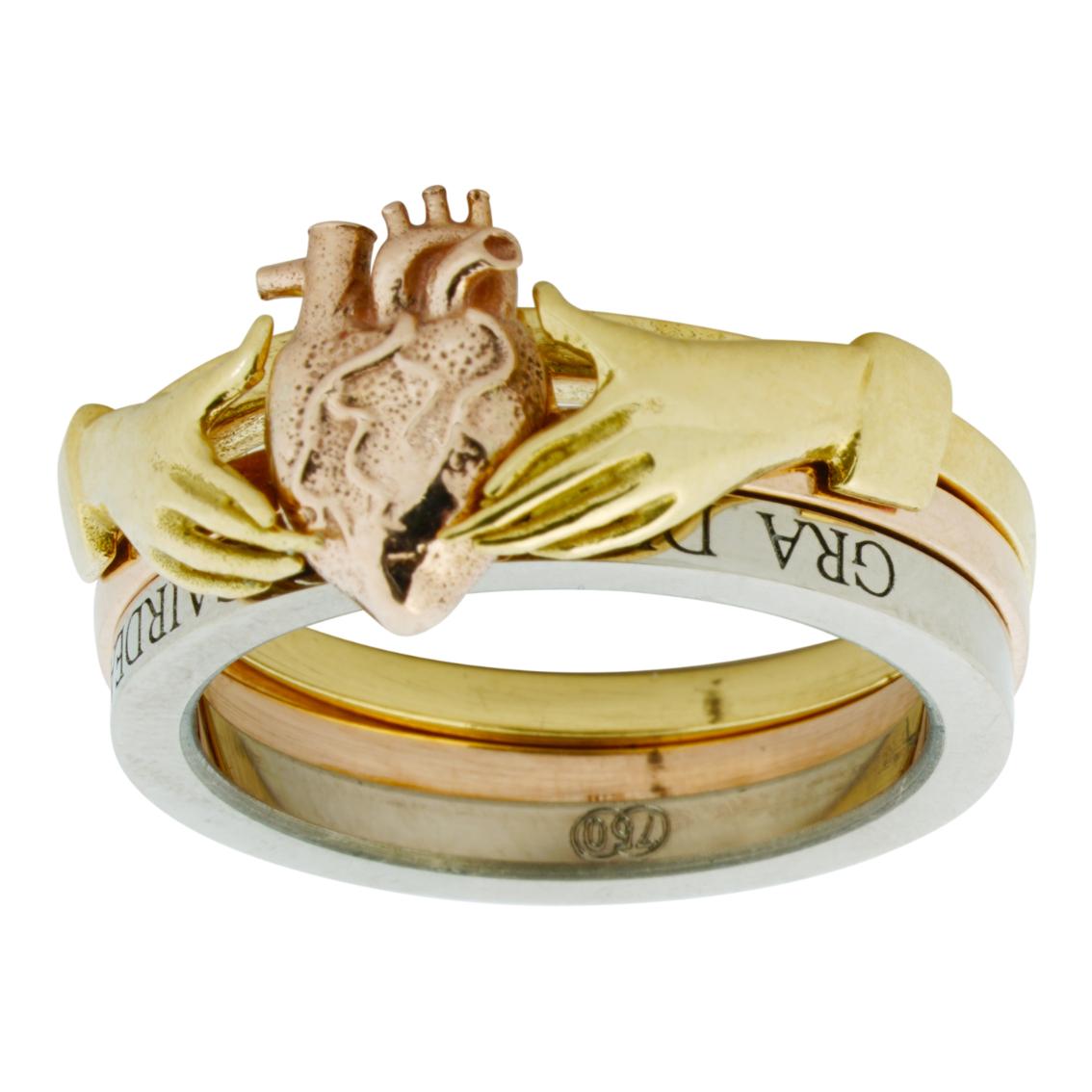 The Anatomical Heart & Claddagh Rings are a stunning set and a charming testament to love.

Exquisitely handcrafted in 18kt yellow, white and rose gold, these three rings can be worn separately or stacked on top of one another. The 18kt white gold