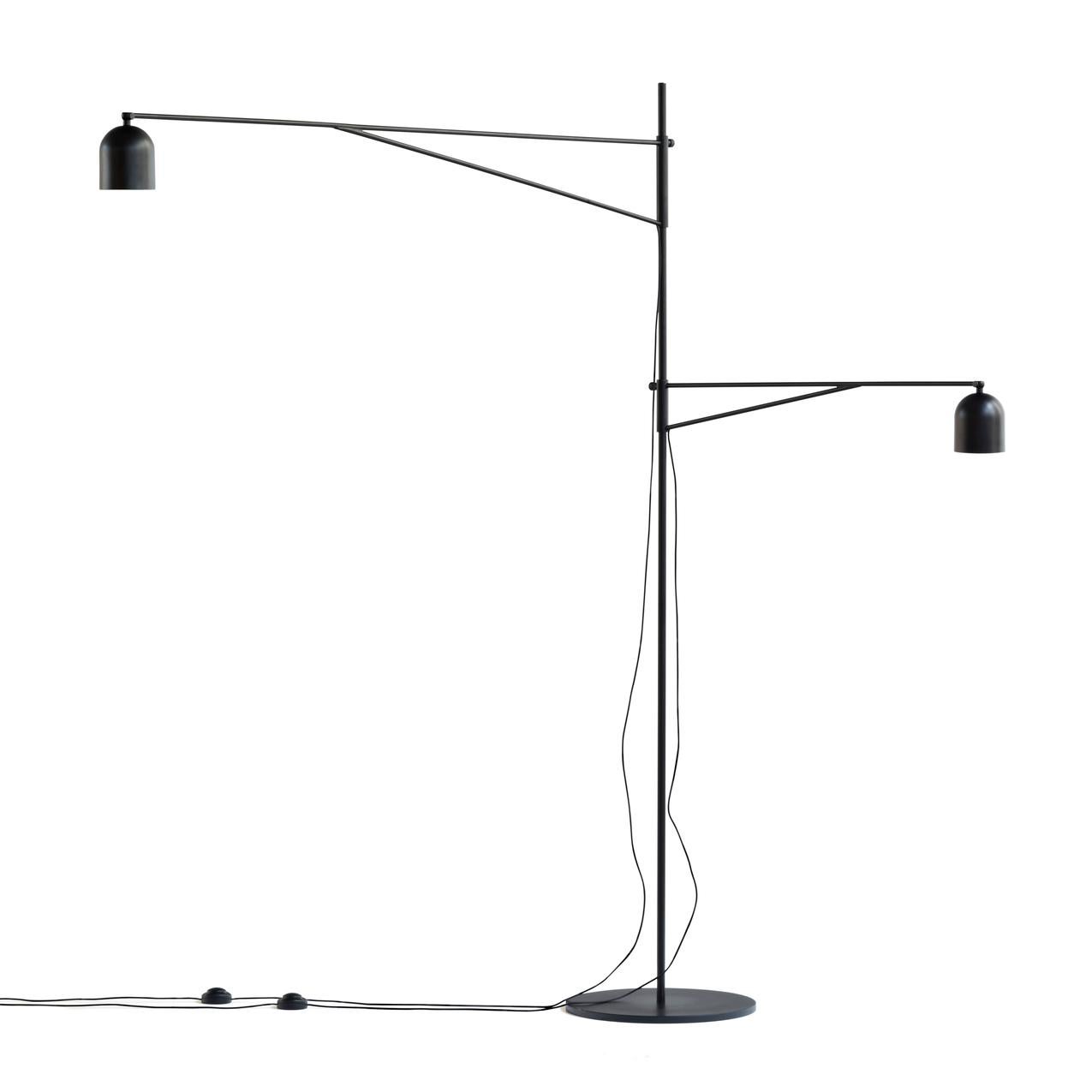 Floor lamp designed by Anatomy Design in 2012. 

Quirky and slightly off, Awkward is a floor lamp with a deliberately peculiar anatomy - its long, slender arms reaching to illuminate two areas in close proximity: two sides of a sofa or both an