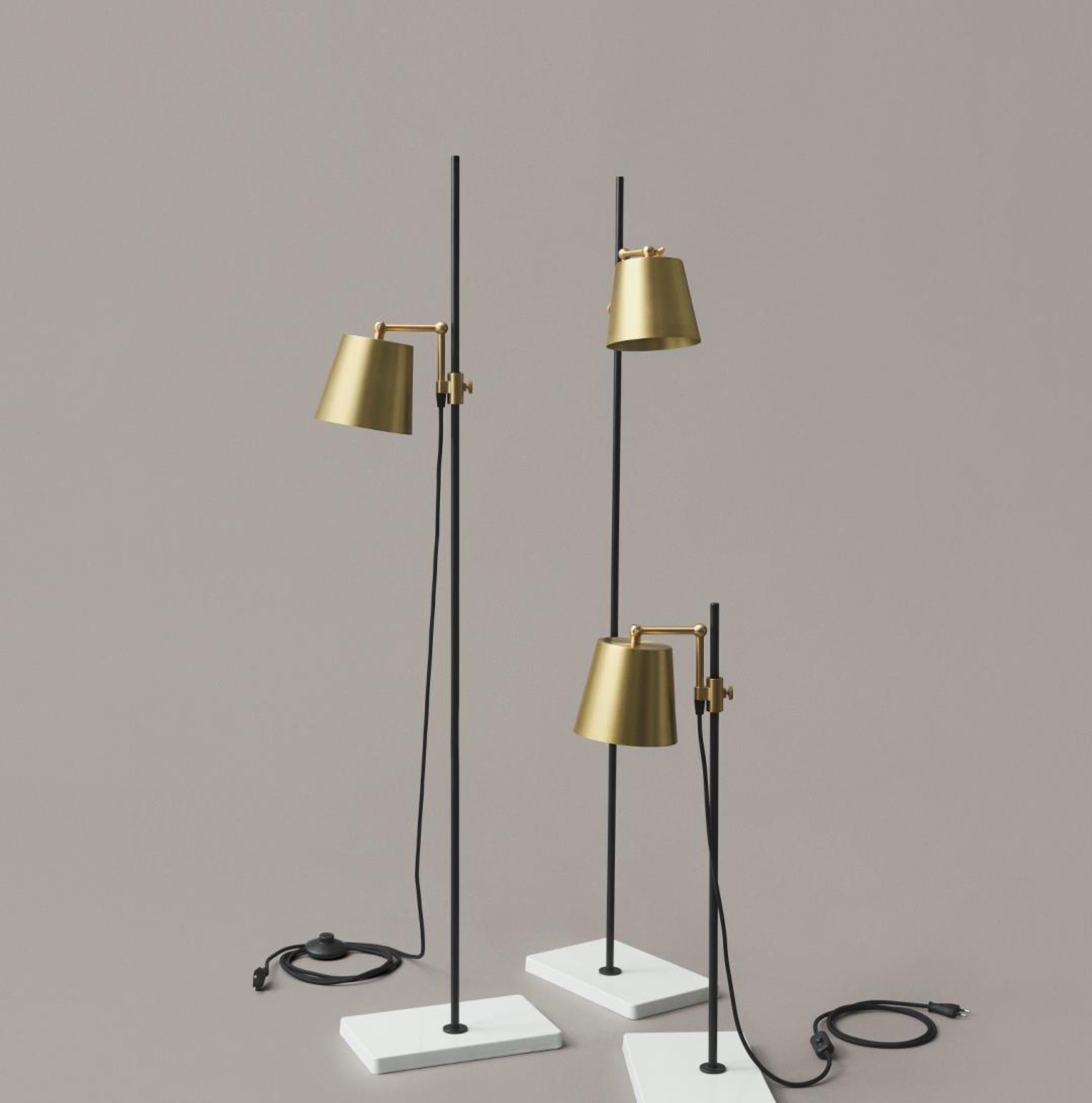 The Lab Light design came about from a genuine fascination with laboratory equipment and with all those fantastic clamps and levers — the perfect place to start designing a multi-functional lamp. Shade measures 16 centimeter in diameter. 

The