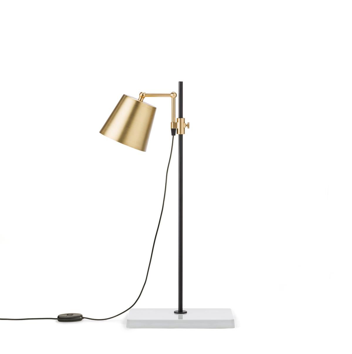 Table lamp designed by Anatomy design in 2010. 

The Lab light design came about from a genuine fascination with laboratory equipment and with all those fantastic clamps and levers — the perfect place to start designing a multi-functional