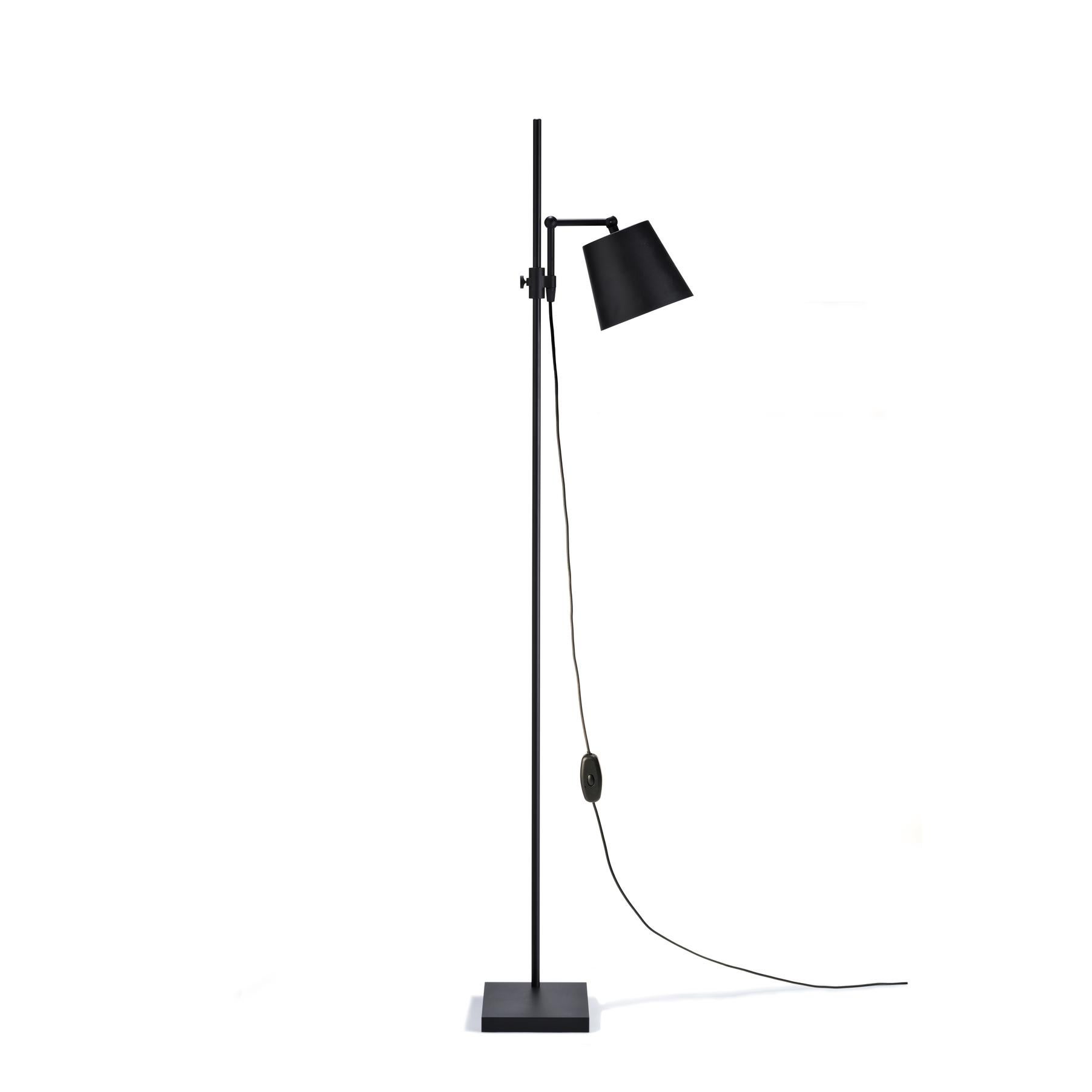 Floor Lamp designed by Anatomy Design in 2010. 

Inspired by her parents’ pharmaceutical work and their old lab equipment, Andrea Kleinloog from Anatomy Design designed the Lab Light mixing steel, brass and porcelain.

This brought on a desire