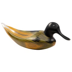 Escultura "Anatra", figura de un pato macho