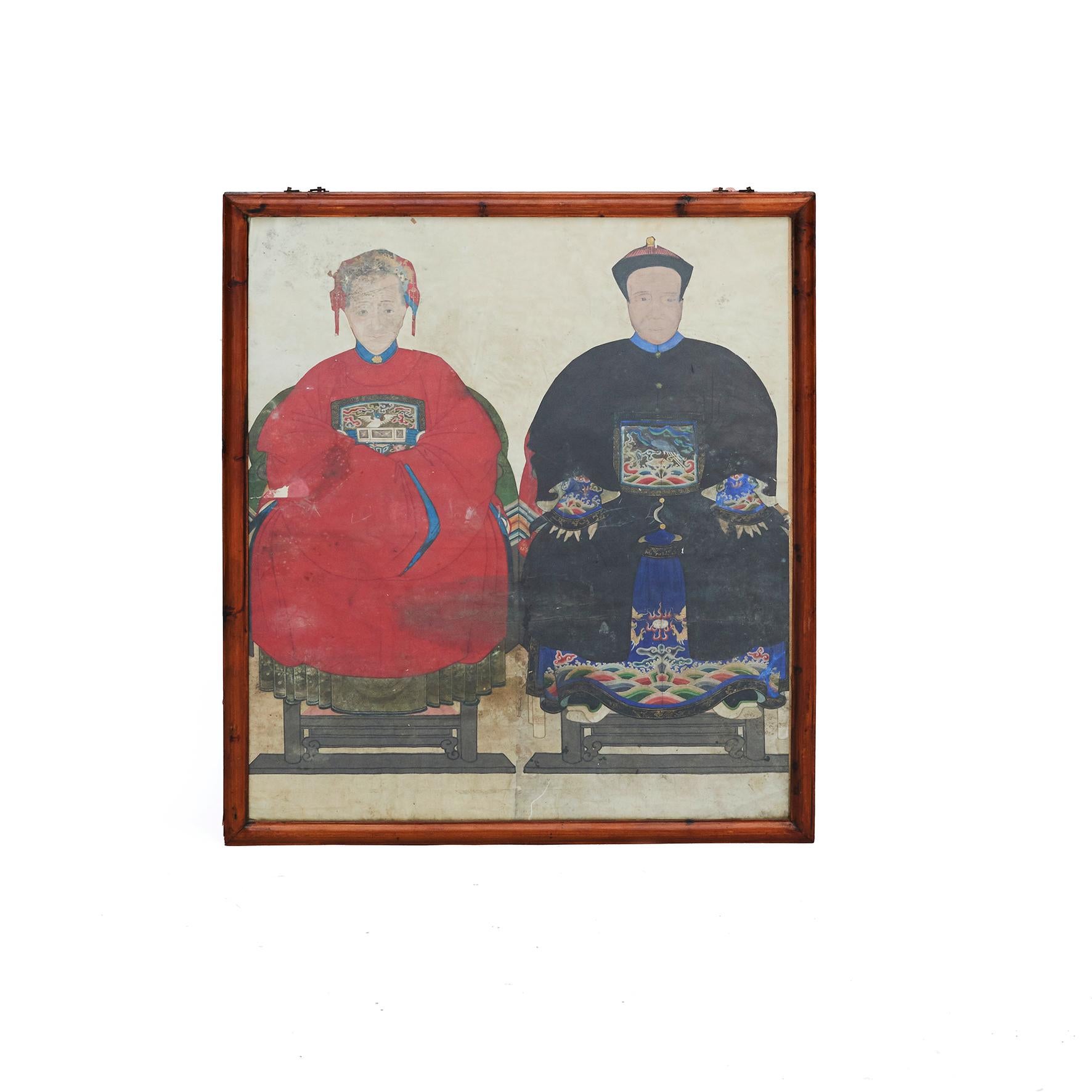 Chinese Ancestor portrait of a mandarin with his first wife. Polychrome gouache on paper, made in quality with many details.
Dimensions with out frame: H: 108, W: 100 cm.

Original frame in cypress wood with glass.
China mid 19th century, Qing