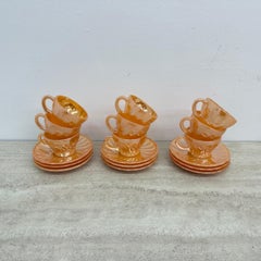 Anchor and hocking fire king Peach Lustre Laurel cup and saucer , 1960s