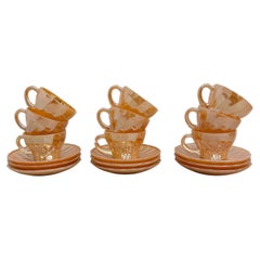 Anchor and hocking fire king Peach Lustre Laurel cup and saucer , 1960s