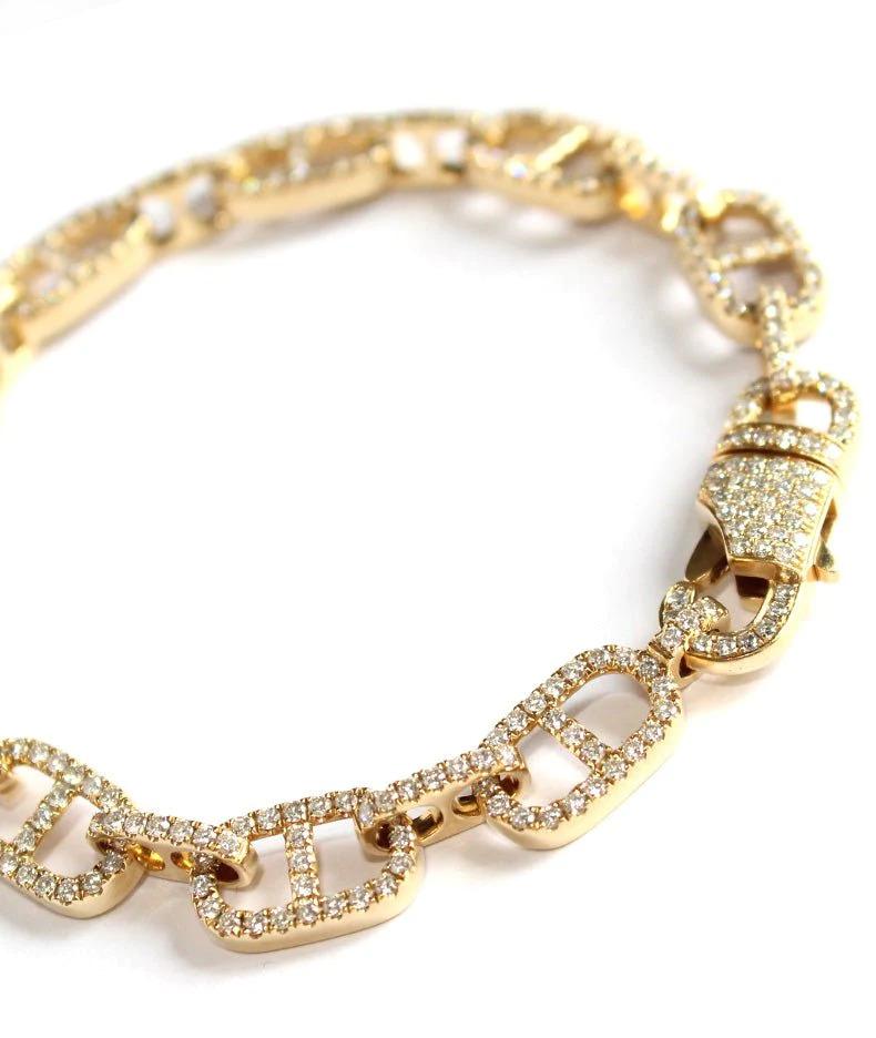 18K Yellow gold - 20.75 GM; 
298 ROUND DIAMONDS - 3.22CT

Introducing the Anchor Chain Diamond Bracelet, a symbol of guidance and emotional depth. This exquisite piece embodies the spirit of navigating thought life's journey. The anchor,