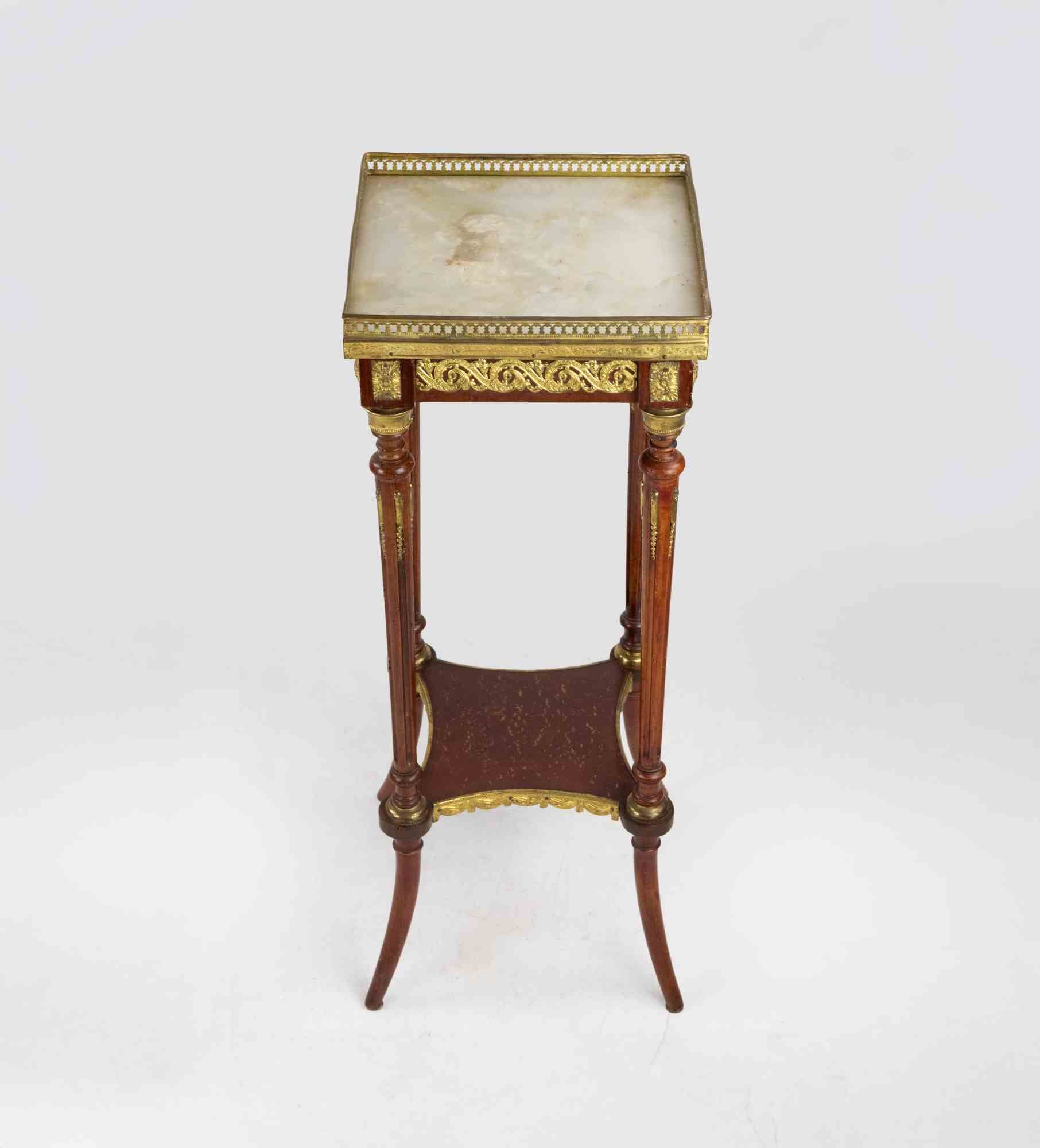 Ancien style Empire Altana réalisé à la fin du 19ème siècle.

Bois et métal doré.

Très bon état.
