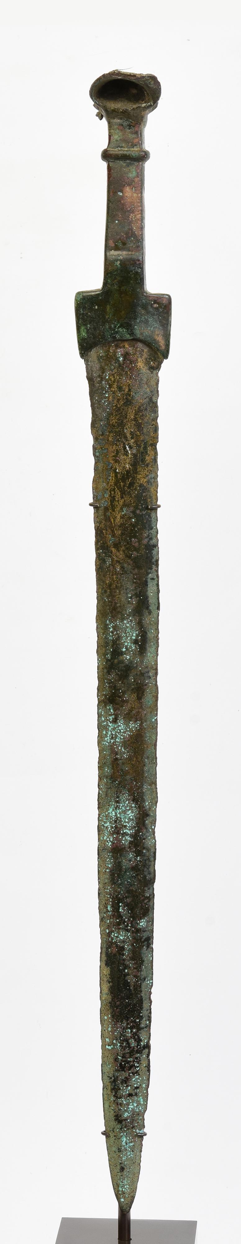 Ancient Luristan bronze sword with green patina.

Luristan bronze comes from the province of Lorestan, a region of nowadays Western Iran in the Zagros Mountains. With its rich and long history, Luristan culture is well-known for its fascinating