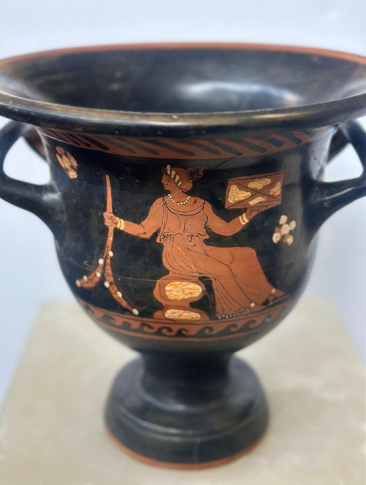 Rare Ancient Apullian Iliupersis pottery bell krater made in the c. 350 B.C. having fine traditional figures. One side shows a seated maiden wearing a sleeveless garment, and the other side shows an abstract depiction of a lady contemplating herself