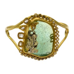 Antico bracciale in vetro romano con patina iridescente e diamanti da 1,55 carati