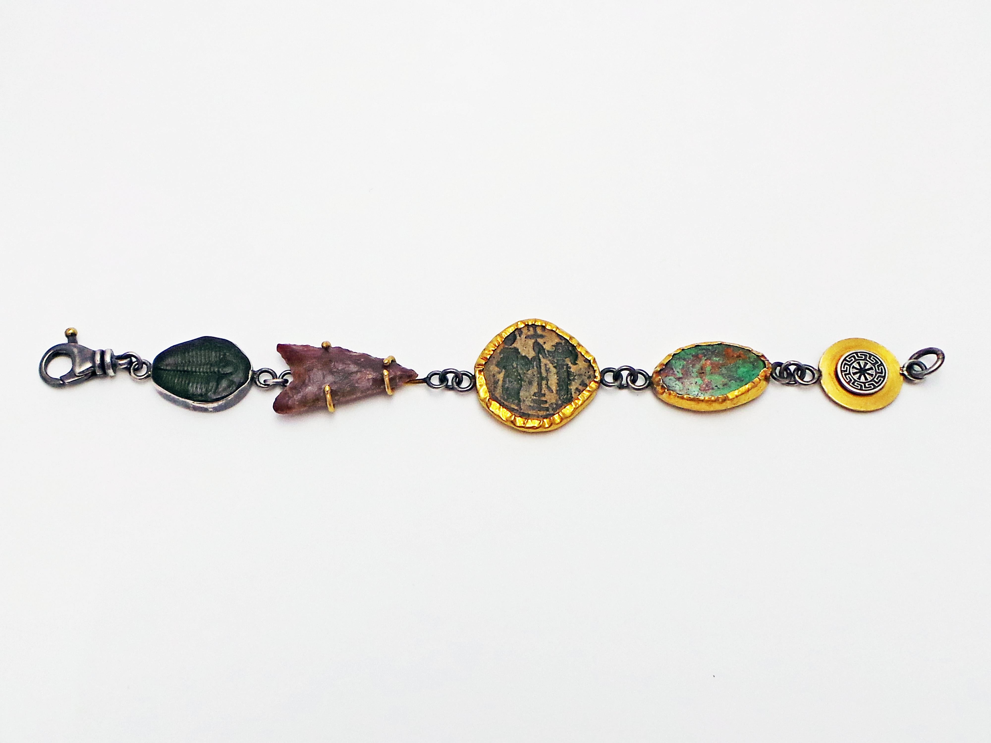 Bohemian bracelet featuring an authentic ancient Byzantine coin (Kōnstantinos X, Follis, AD 1059-1067), stone arrowhead, Trilobite fossil, and Kings Manassa turquoise (from the closed mine in Colorado, USA) linked together with oxidized sterling