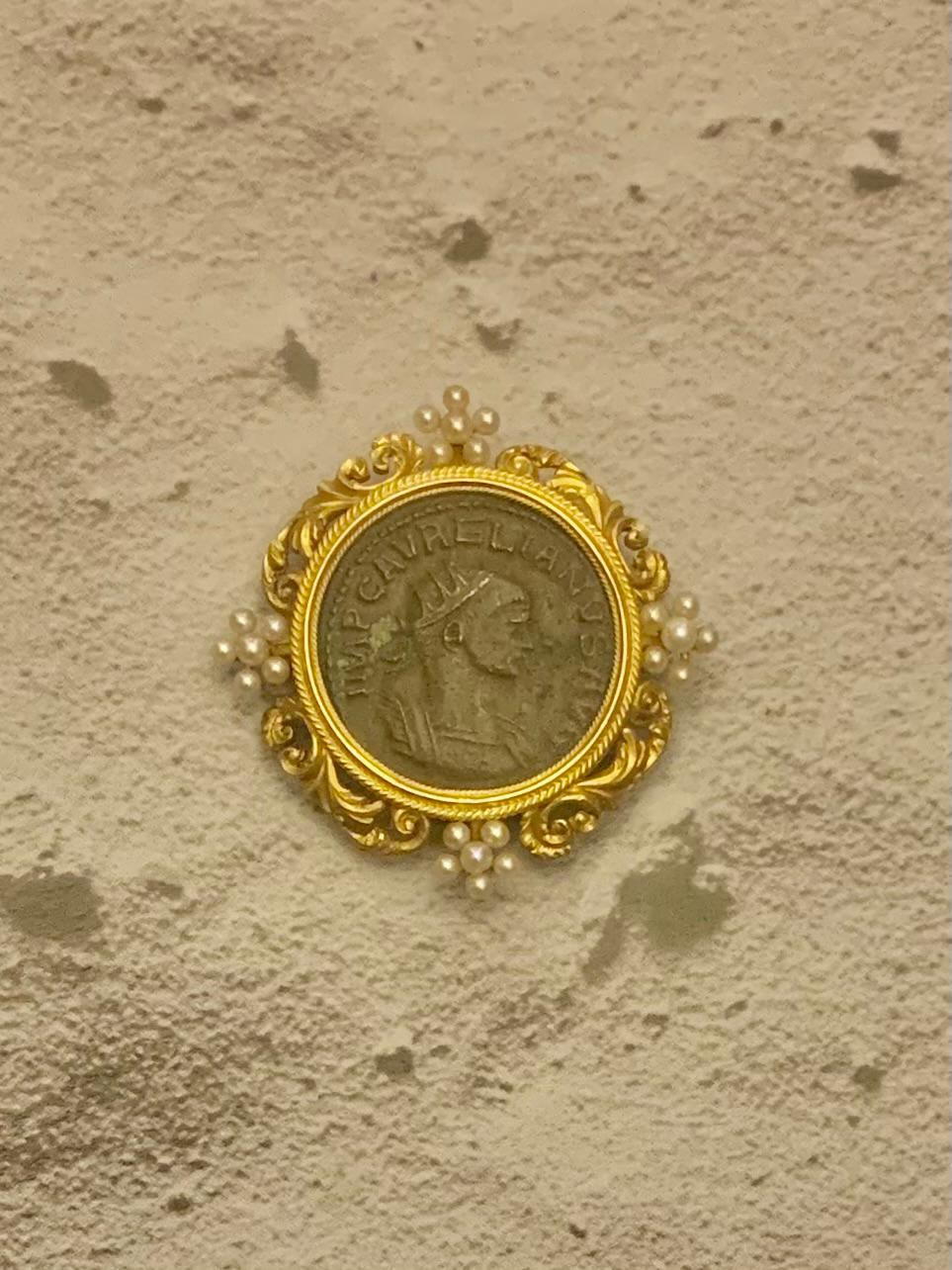Antique Renaissance Revival large 14K yellow gold and natural pearl ancient Roman Imperial coin- Ae Antoninianus- Aurelian Circa 275 AD pendant/brooch
Gold setting- 19th century
Roman coin - silver- ancient-Circa 275 AD
Fine estate ancient Aurelian