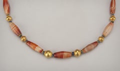 Ancient Barrel Shaped Agate Beads with Lapis Lazuli and Collared 22k Gold Beads