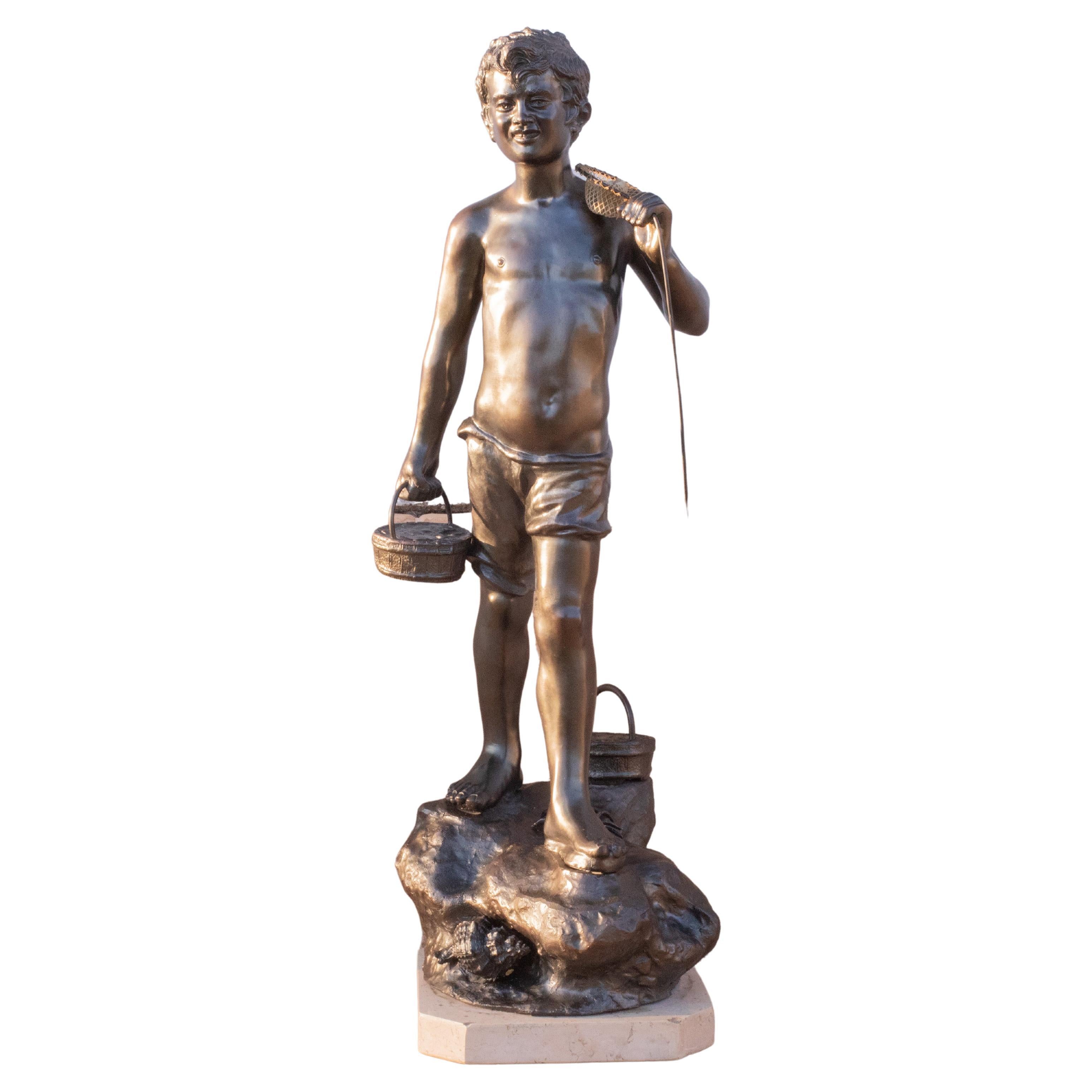 Ancienne statue de « jeune pêcheur » en bronze et marbre