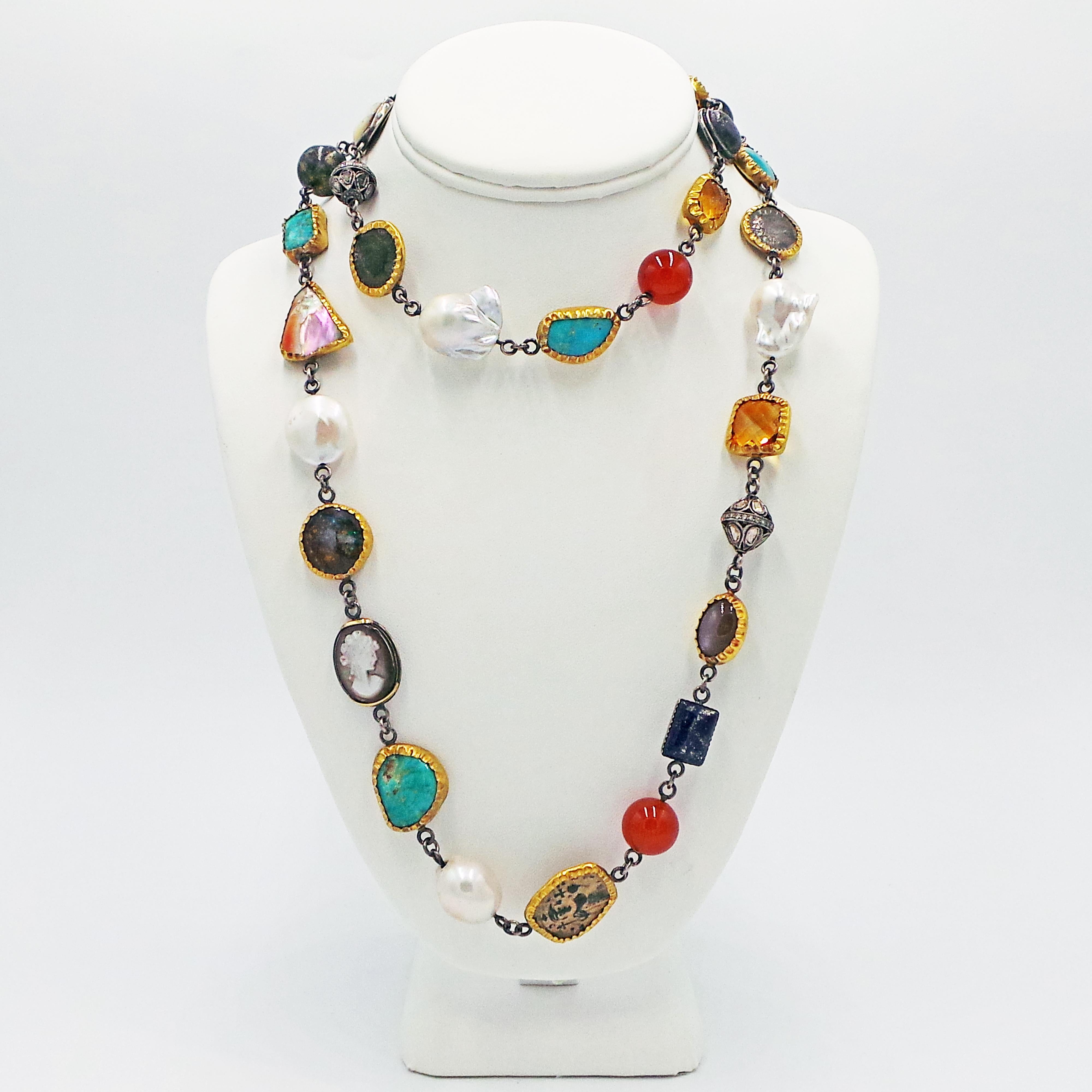 Gorgeous Bohemian style necklace links a variety of gemstones, ancient Byzantine, Greek and Roman coins, pearls, vintage cameos and rose-cut diamond beads. This stunning necklace has a total of 32 pieces.  Sixteen pieces are wrapped with 24k yellow