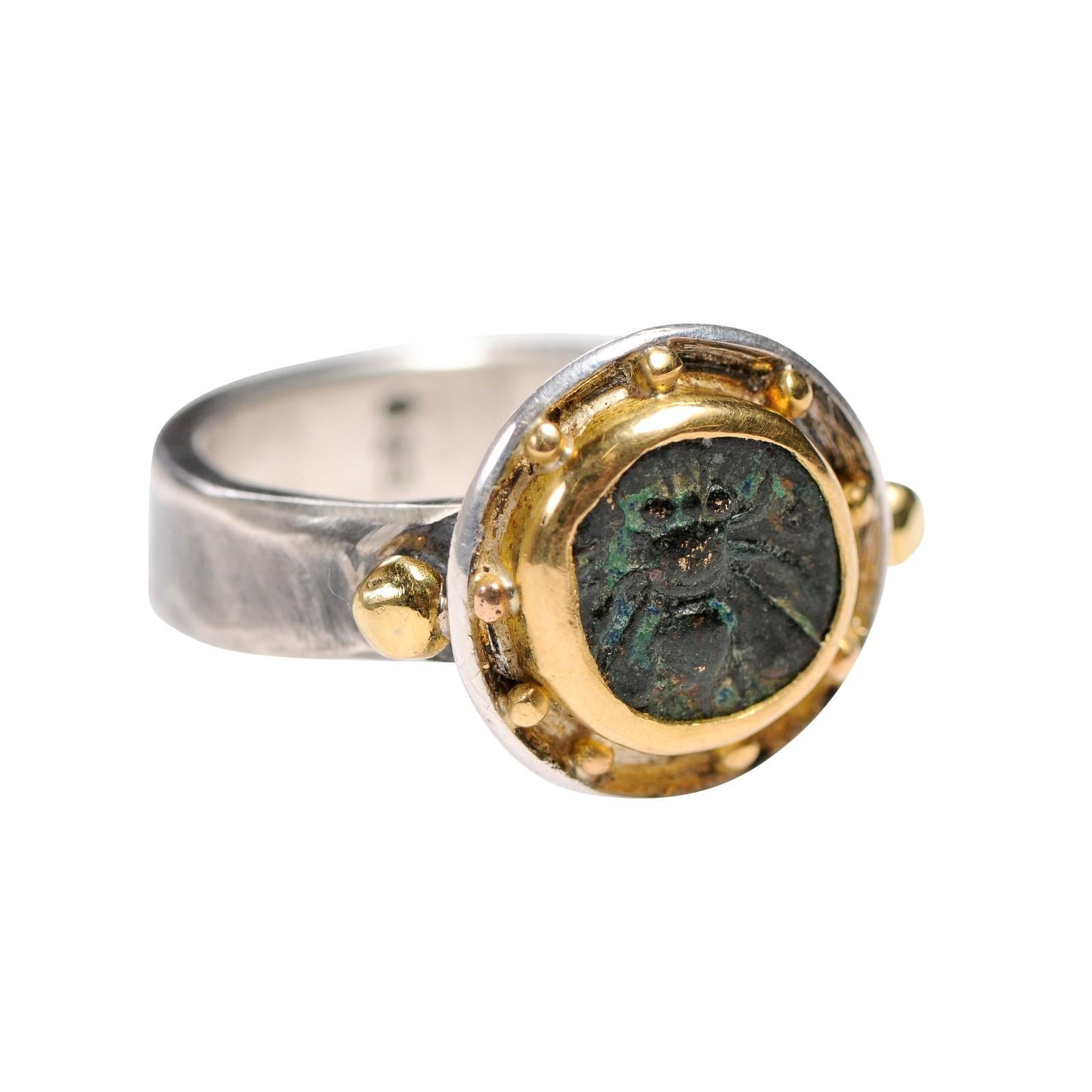 Ephesus Bee/Stag ring 22kt gold and An authentic ancient Greek bronze coin from Ephesos, Ionia (circa 1st century BC) custom mounted within a 22k gold round bezel with ball accents, and an outer sterling silver bezel (two-tone metal) and band.