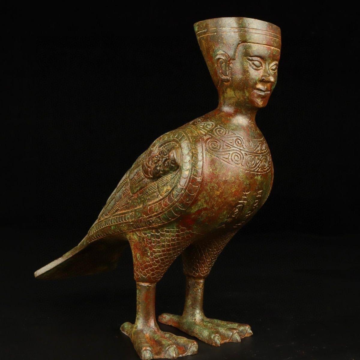 Old Asian Bronze Standing Bird With Human Head Statue – Rare Old Figurine

Add a touch of mystery and cultural richness to your collection with this Old Asian Bronze Standing Bird Statue featuring a Human Head. Expertly crafted in bronze, this