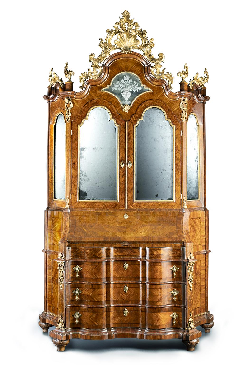 Bureau cabinet (trumeau)
Venice, circa mid-18th century
Structure made of walnut and spruce wood veneered with walnut; the decoration on the top is made of carved and gilded wood.  The mirrors are mercury-backed and the handles are made of gilded