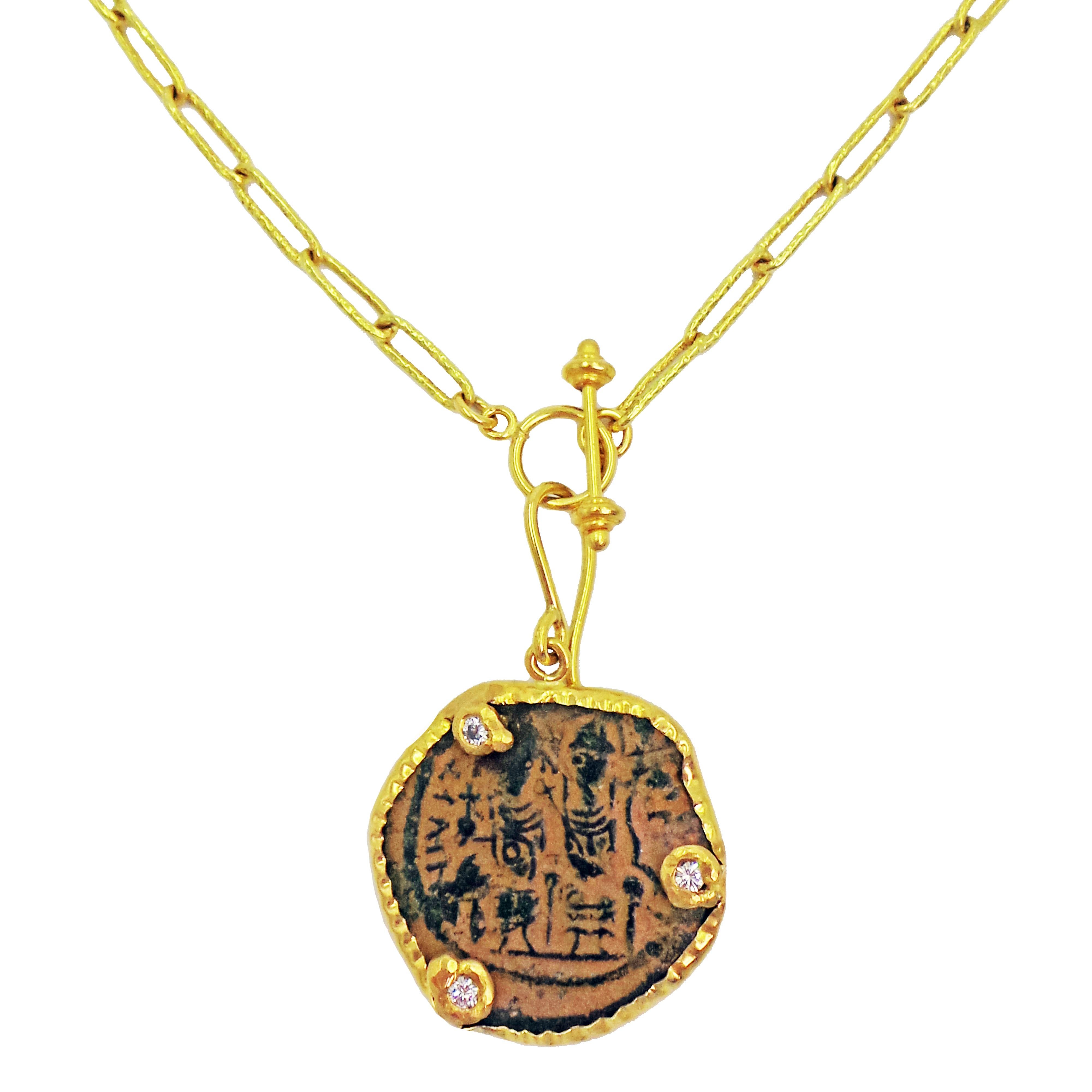 Authentic ancient Byzantine bronze coin (Justin II an Queen Sophia, 565 AD) and 3 diamonds (total weight 0.30 carat, SI1-SI2 clarity, G-H color) set in a 22k yellow gold pendant with hook bail. Pendant is on a solid, hammered 22k gold hand-made 24