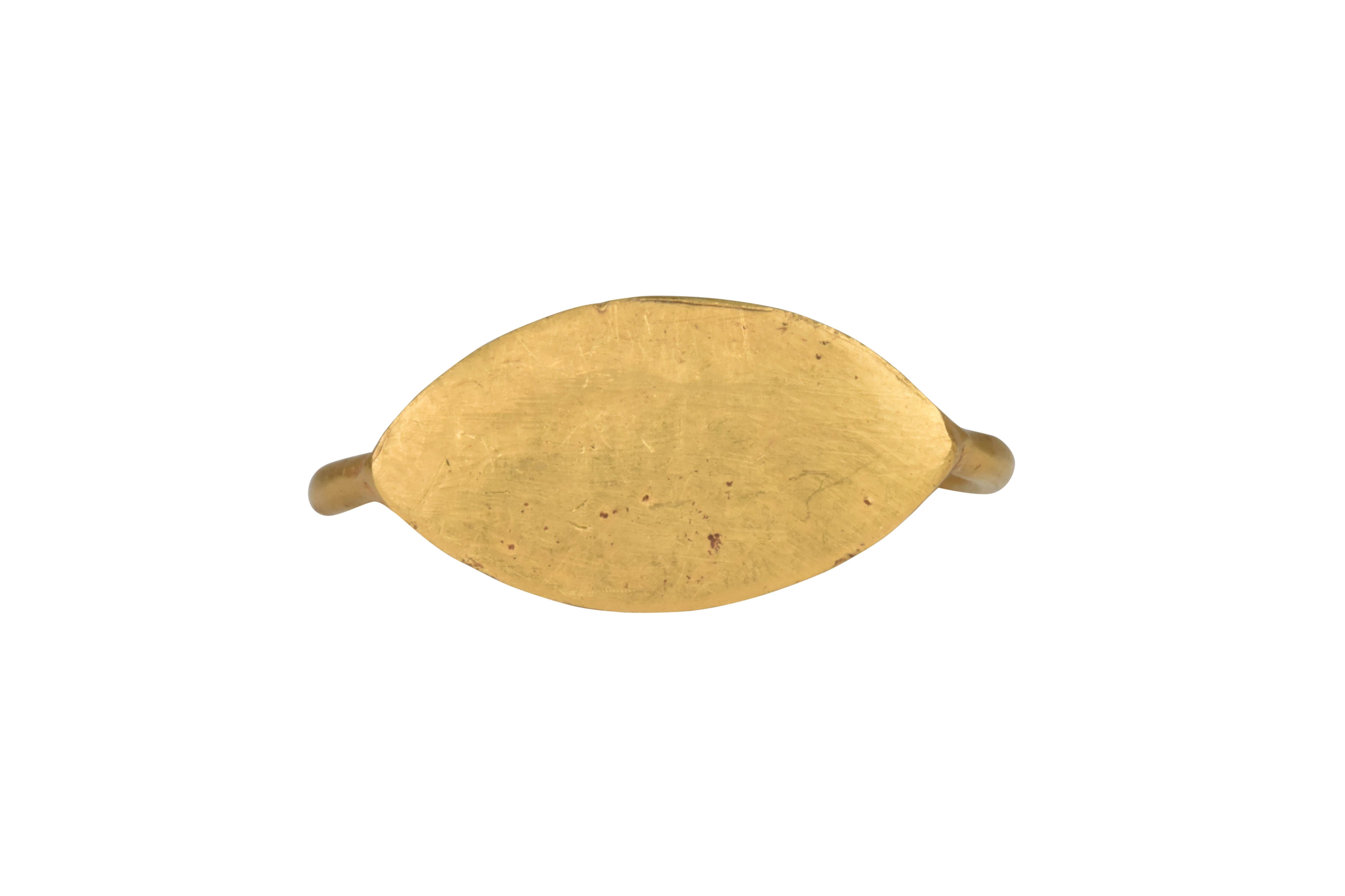 Ancient Celtic Iron Age Gold Ring

Ca. 100 BC, An Ancient Celtic, Iron Age gold ring composed of a delicate D-shaped, round-section hoop supporting an elliptical, smooth bezel.

Size: D: 17.35mm / US: 7 / UK: O; 3.82g

Provenance: From a Central