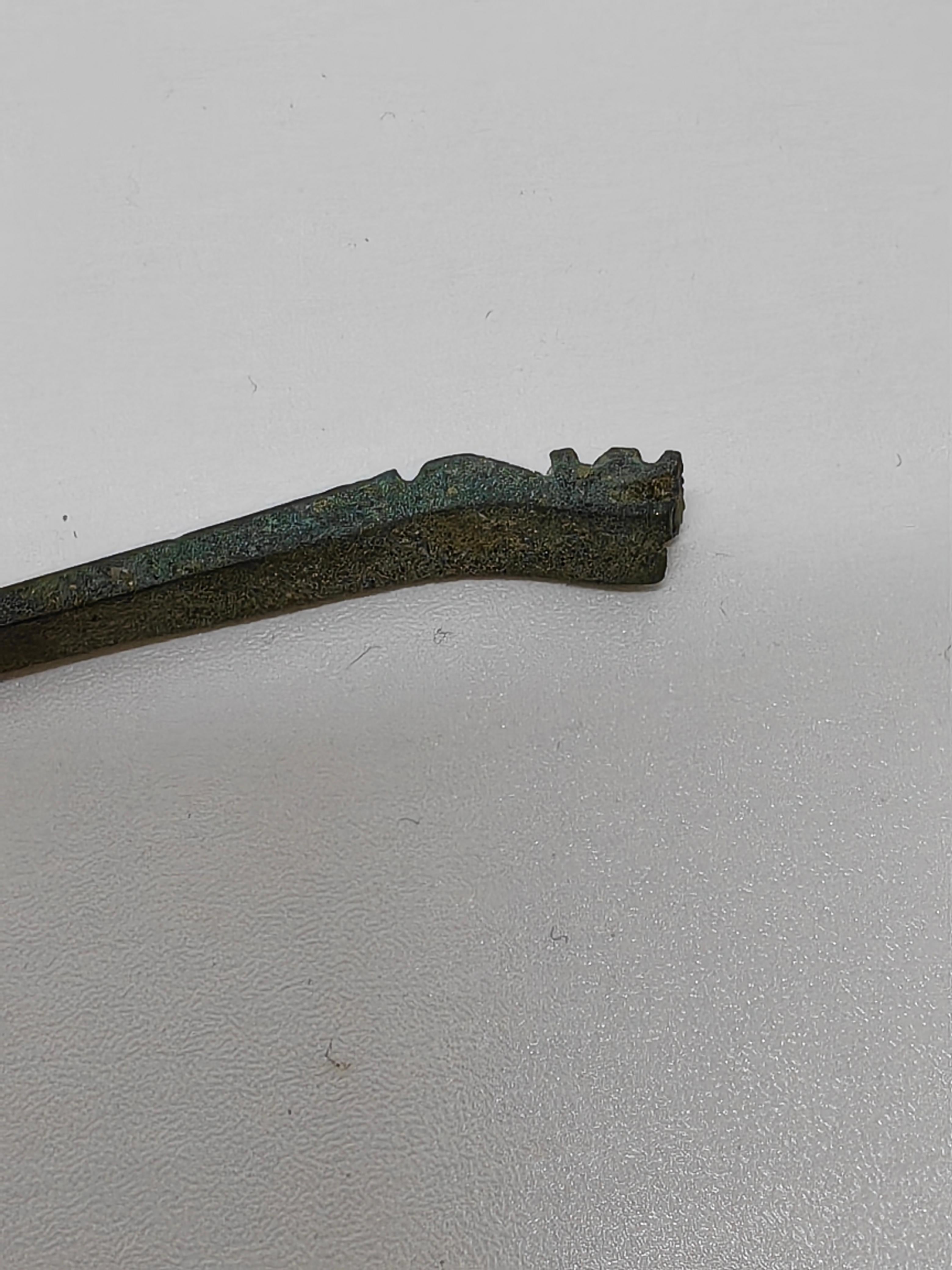 Bronze Dragon Head Hairpin

This exquisite bronze dragon head hairpin is a stunning piece of ancient Chinese craftsmanship, representing the rich cultural heritage and artistic of Chinese artisans.

Design and Symbolism: The hairpin features a