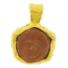 Ancien artefact en argile monté sur un pendentif en or 22 carats