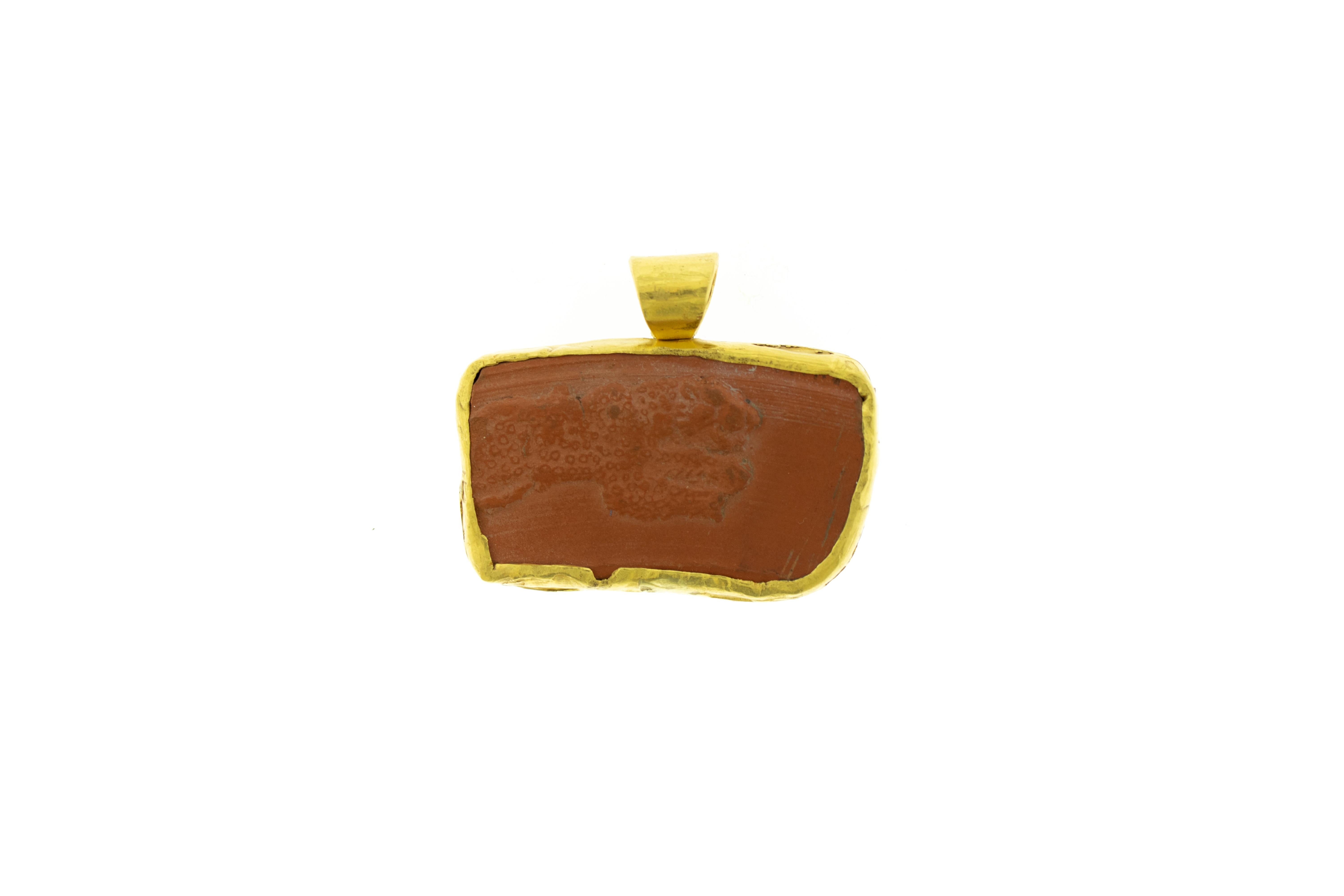 Ancient Clay Artifact Mounted in 22k Gold Pendant. Total weight 48.32 Grams. 22k Gold casing was not made in ancient time. Length 2.2 inches Height 1.75 inches