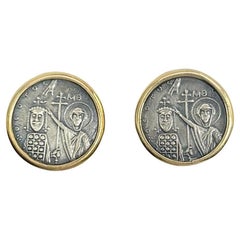 Orecchini a clip con monete antiche in 18k