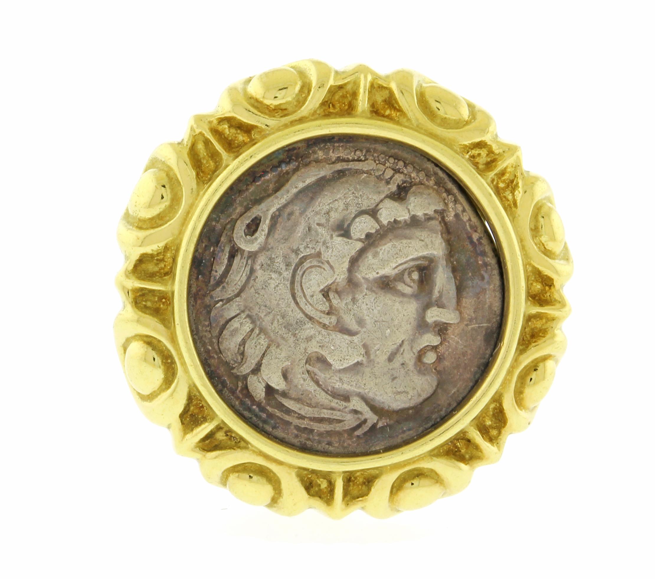 These ancient coin earrings, set in a decorative bezel, are crafted from 18K yellow gold. The clips on the earrings are made of 14K yellow gold, adding a touch of timeless elegance to the design.
♦ Metal: 18 karat with 14karat gold clips
♦ 15/16ths