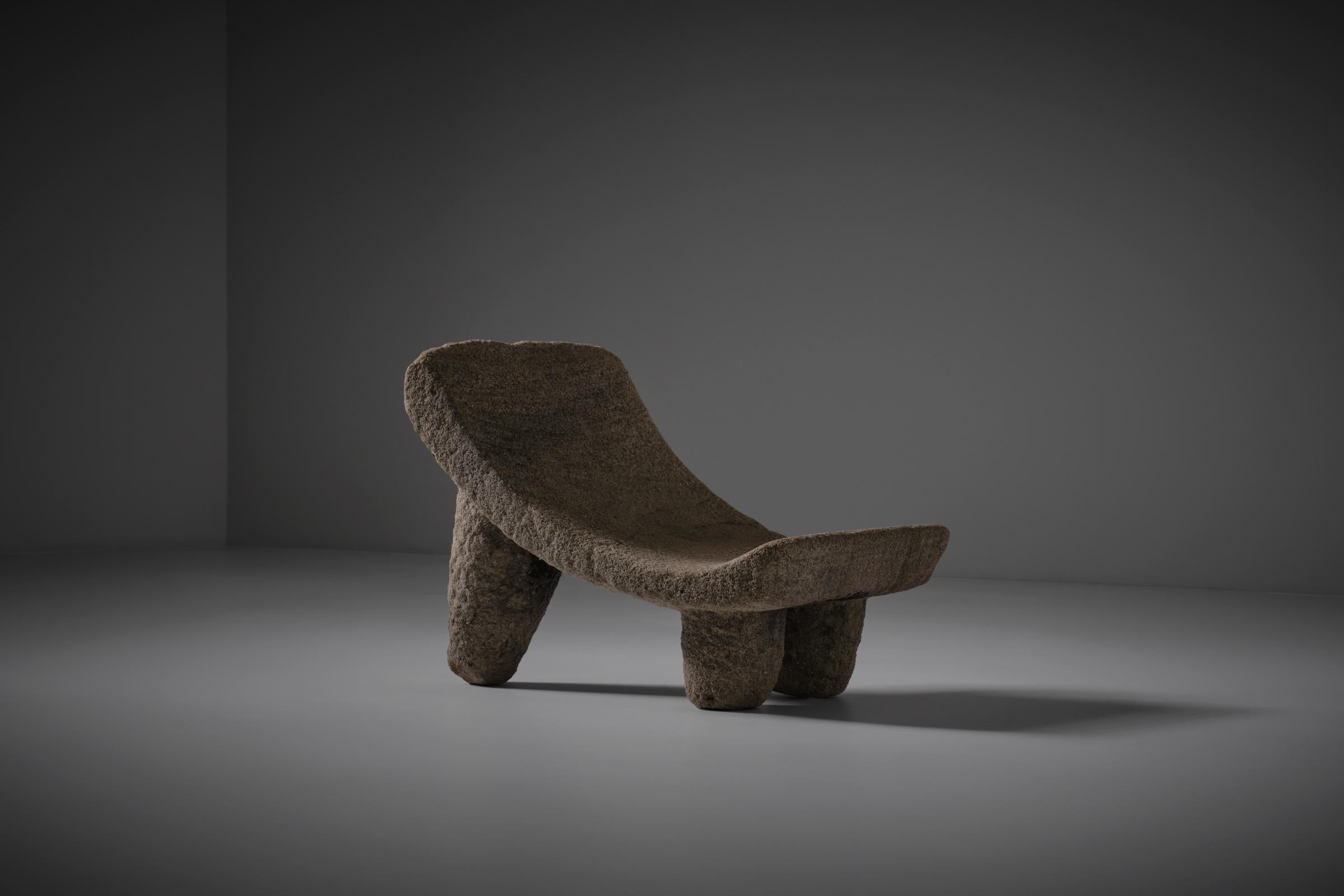 Original hand carved Ancient Curved Granite stool. Very nice stool carved out of one solid piece of Granite. The beautifully curved seat is supported by three sturdy legs. Very decorative piece with a characteristic patina.
