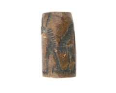 Ancient Cylinder Seal Carved From Brown Stone
