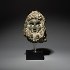 Ancient Egypt Head of a sculpture of the god Serapis in schist