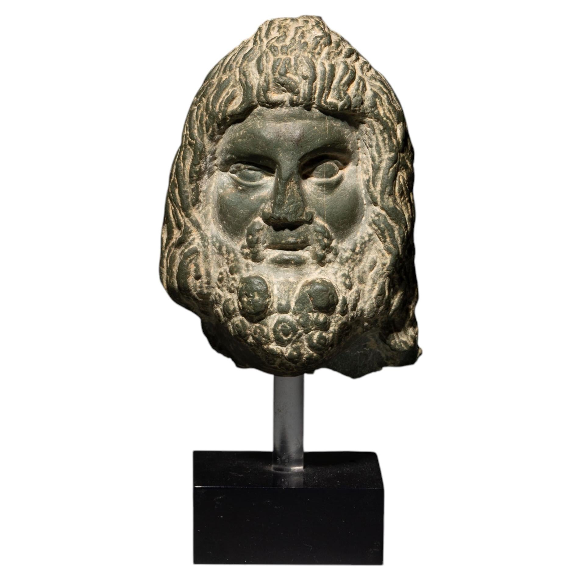 Ancient Egypt Head of a sculpture of the god Serapis in schist