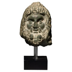 Ancient Egypt Head of a sculpture of the god Serapis in schist