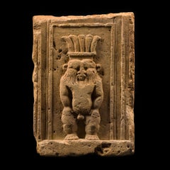 Ancient Egypt Stele with the image of the god Bes in limestone